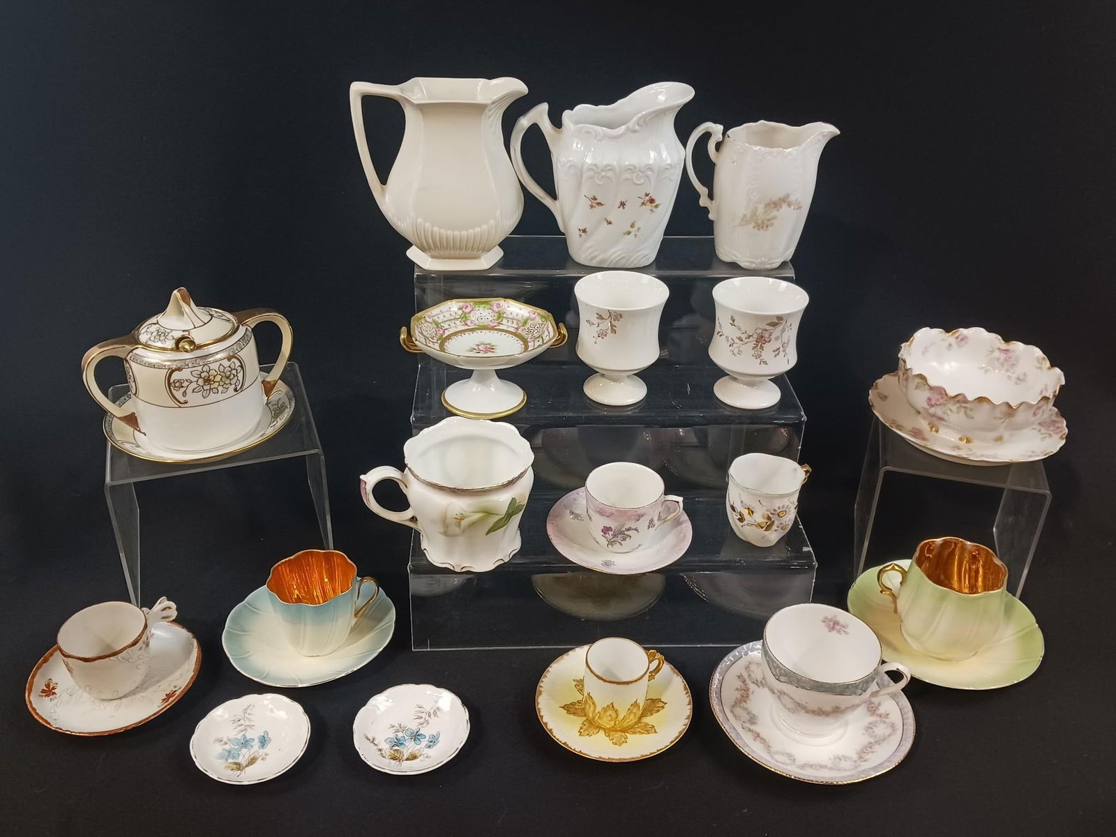 27 Pcs China: Plates measure 3-1/4" to 6" diameter.