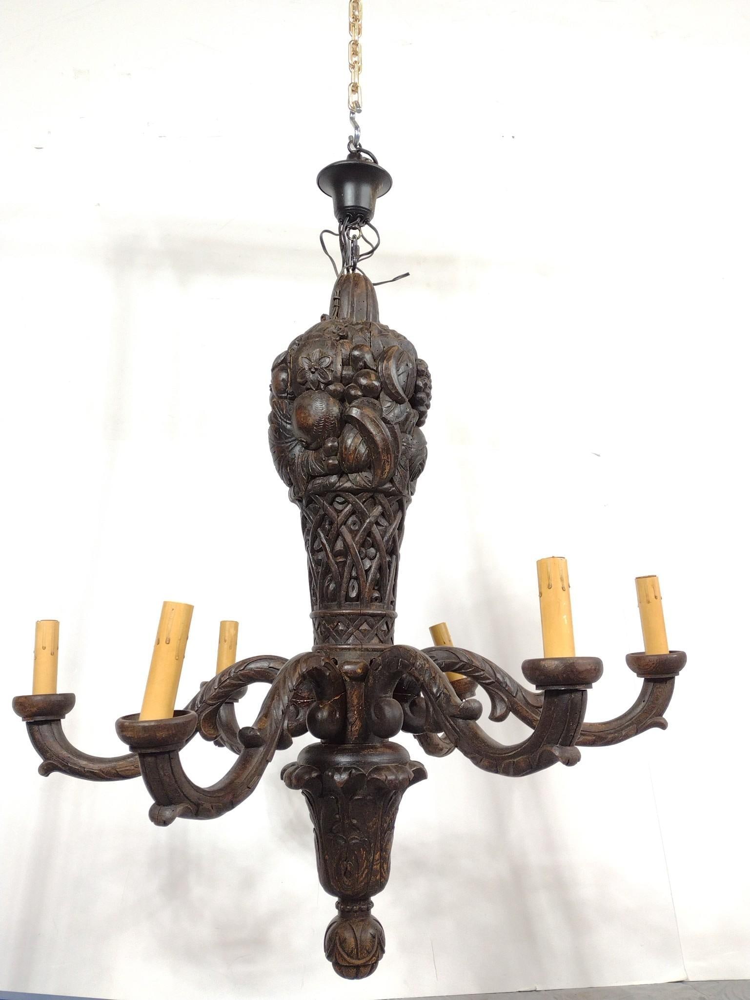 Antique Wood Chandelier: 38" diameter X 48" high. All arms have repair.