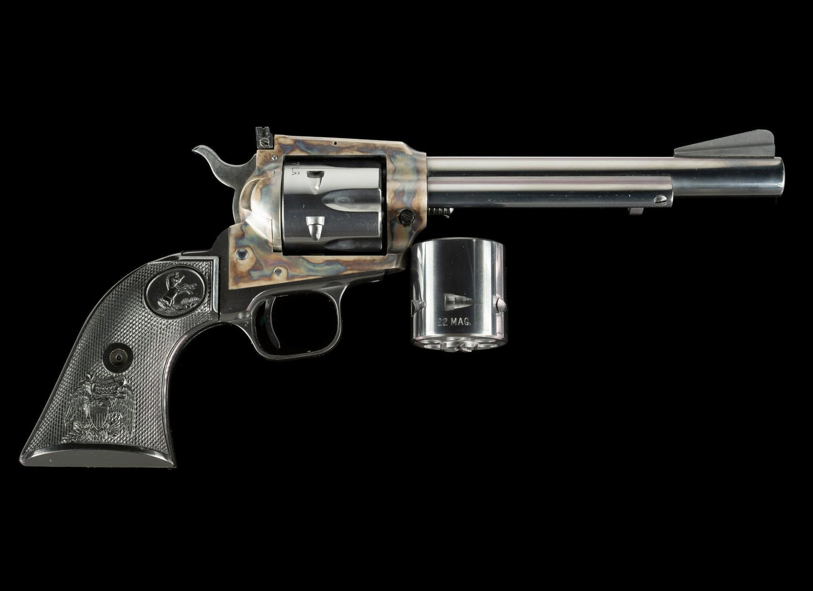 Colt New Frontier Single Action Revolver, Caliber .22/.22 Magnum: Serial Number: G180146 Design: The Colt New Frontier was introduced in 1961 and this example dates to 1976. This revolver is of flat-top design with an adjustable rear sight and a ramp front sight. Co