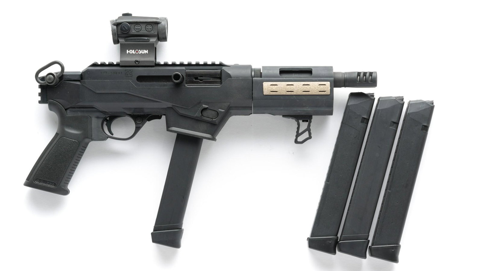 Ruger PC Charger Tactical Semi Auto Pistol w/ Optics, Caliber 9mm Luger: Serial Number: 913-09281 Design: This Ruger PC Charger is finished in matte black with a black polymer lower with pistol grip. 6 1/2" barrel with compensator that adds about 1" to the length. Picatinn