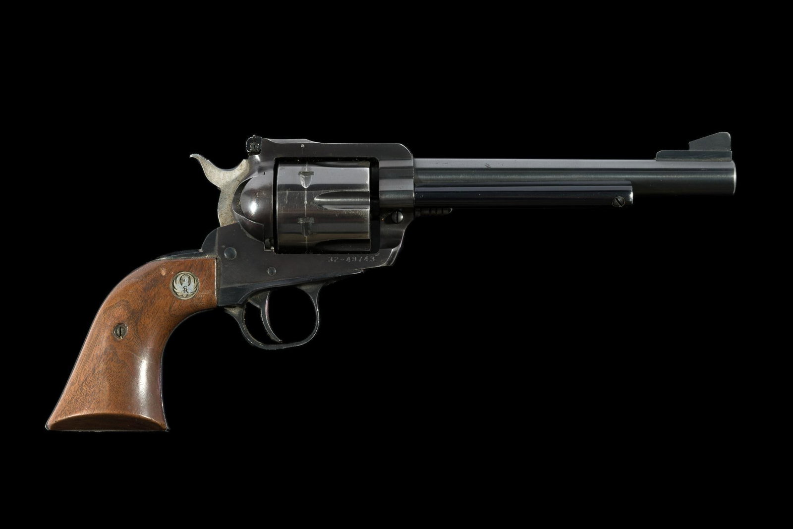 Ruger New Model Blackhawk Single Action Revolver, Caliber .357 Magnum: Serial Number: 32-49743 Design: This Ruger New Model Blackhawk is a single action revolver with a 6 1/2" barrel and 6-shot cylinder chambered for the .357 magnum cartridge. This piece dates to 1974 an