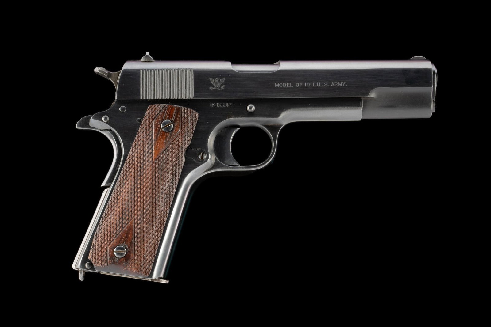 U.S. Pistol M1911, Springfield Armory, Caliber .45ACP: Serial Number: 82247 Design: Here we have a M1911 G.I. semi auto pistol in caliber .45ACP. The slide shows 1897, 1902, 1905 and 1911 patent dates and is marked "Springfield Armory/U.S.A." Ordnance bom