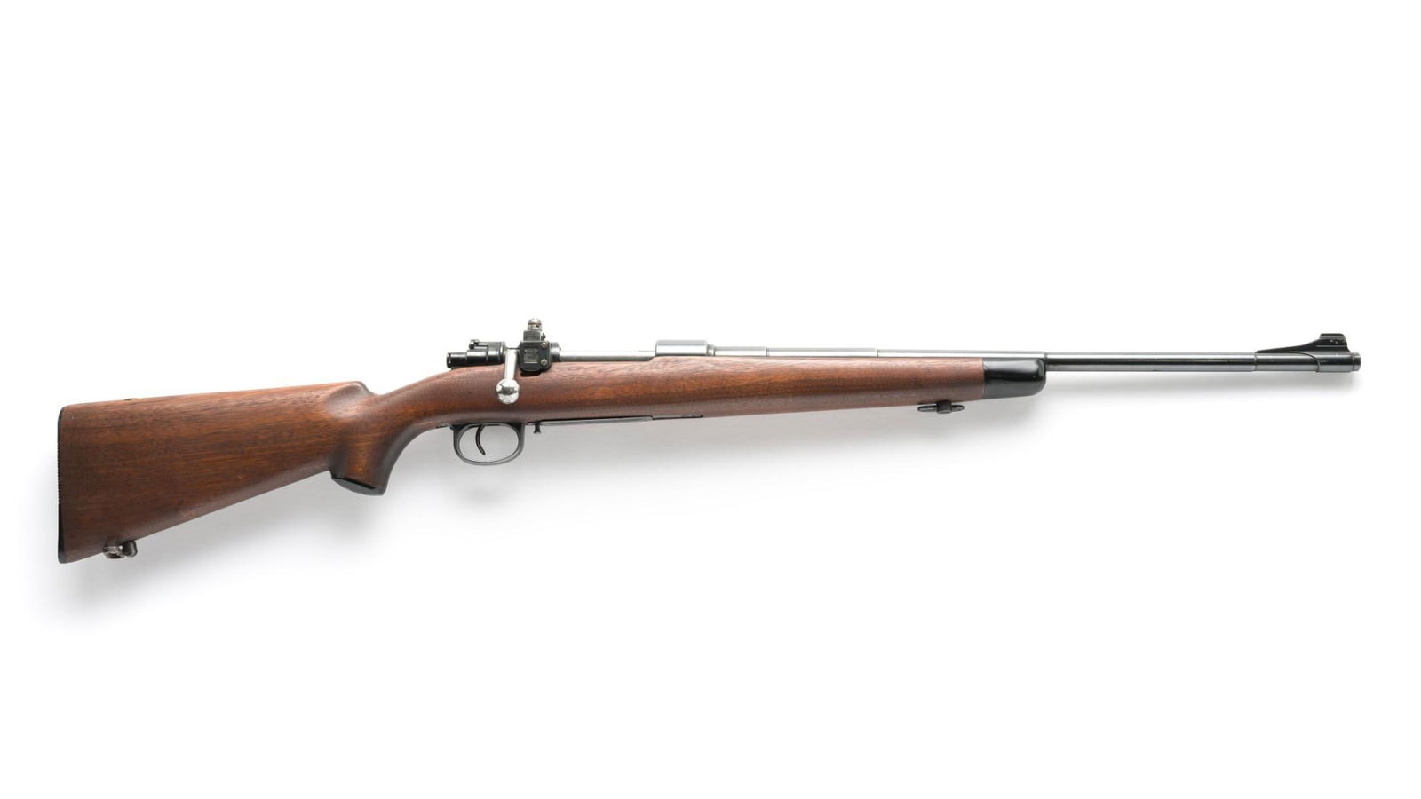 Sporterized Model 98 German Mauser, Caliber 8mm: Serial Number: 1718 Design: Here we have a WWII German Mauser Model 98 rifle that has been sporterized. The work appears to be professional. The original barrel accompanies the receiver which is marke