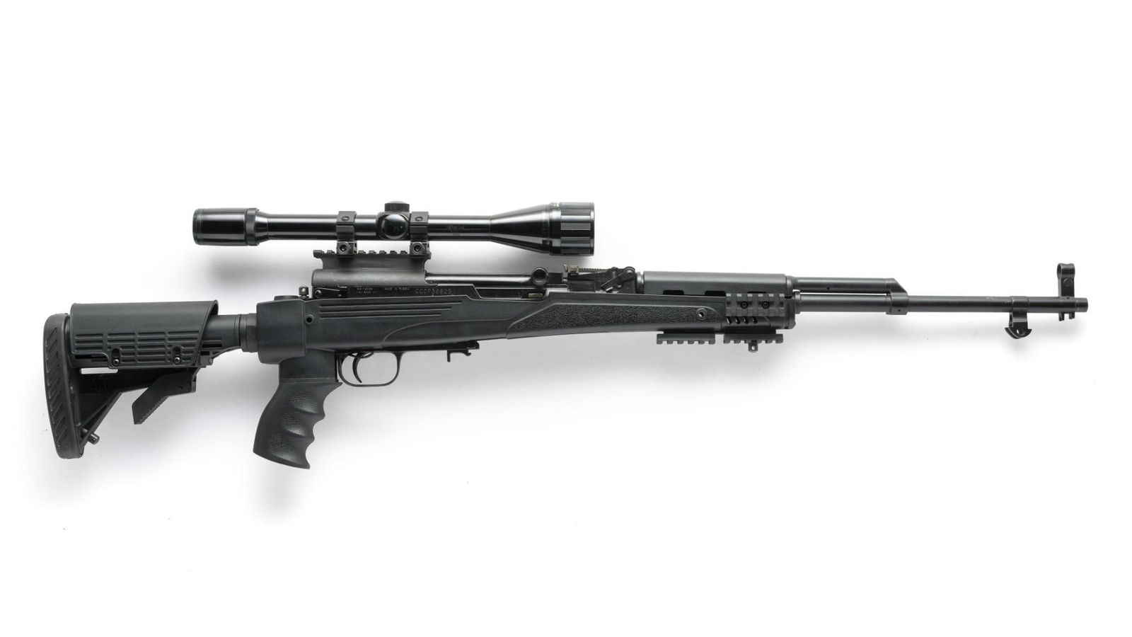 Customized Russian SKS Carbine w/ Scope, Caliber 7.62x39: Serial Number: CCCP36825 Design:This Russian SKS carbine has a 20" barrel and the bayonet has been removed; lug still remains. The wooden stock has been removed and replaced with a black polymer ATI b