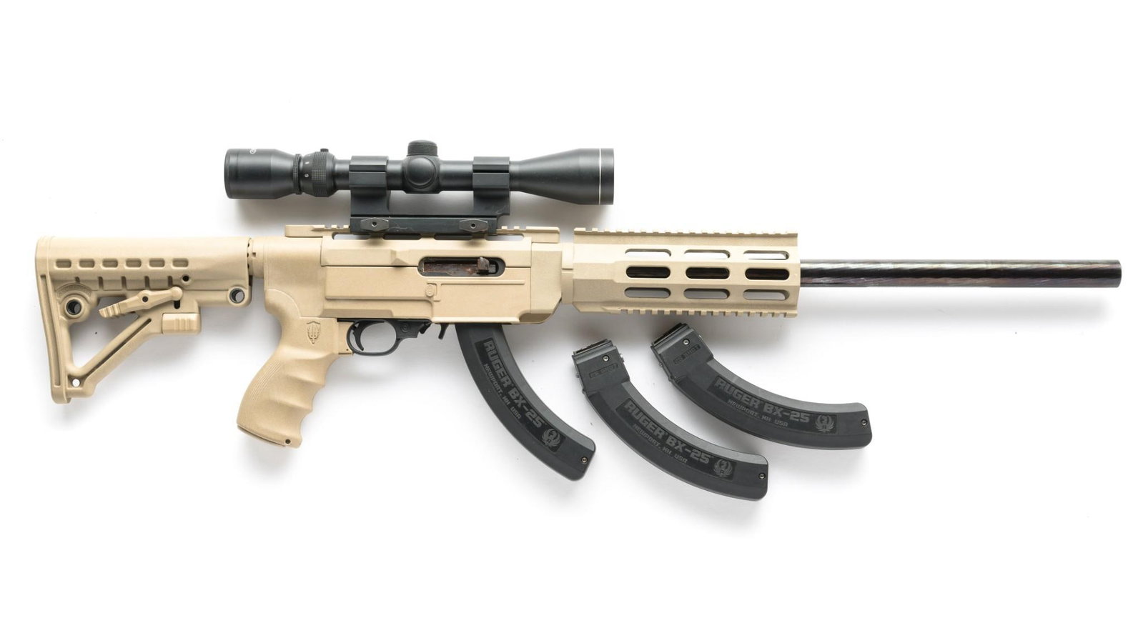Ruger 10-22 Semi Auto Rifle w/ Aftermarket Stock, Caliber .22lr: Serial Number: 352-67644 Design: This Ruger 10-22 is marked on the barrel "Ruger Newport NH, U.S.A." and has been fitted with a desert brown Archangel 5.56 polymer stock with pistol grip and sliding b