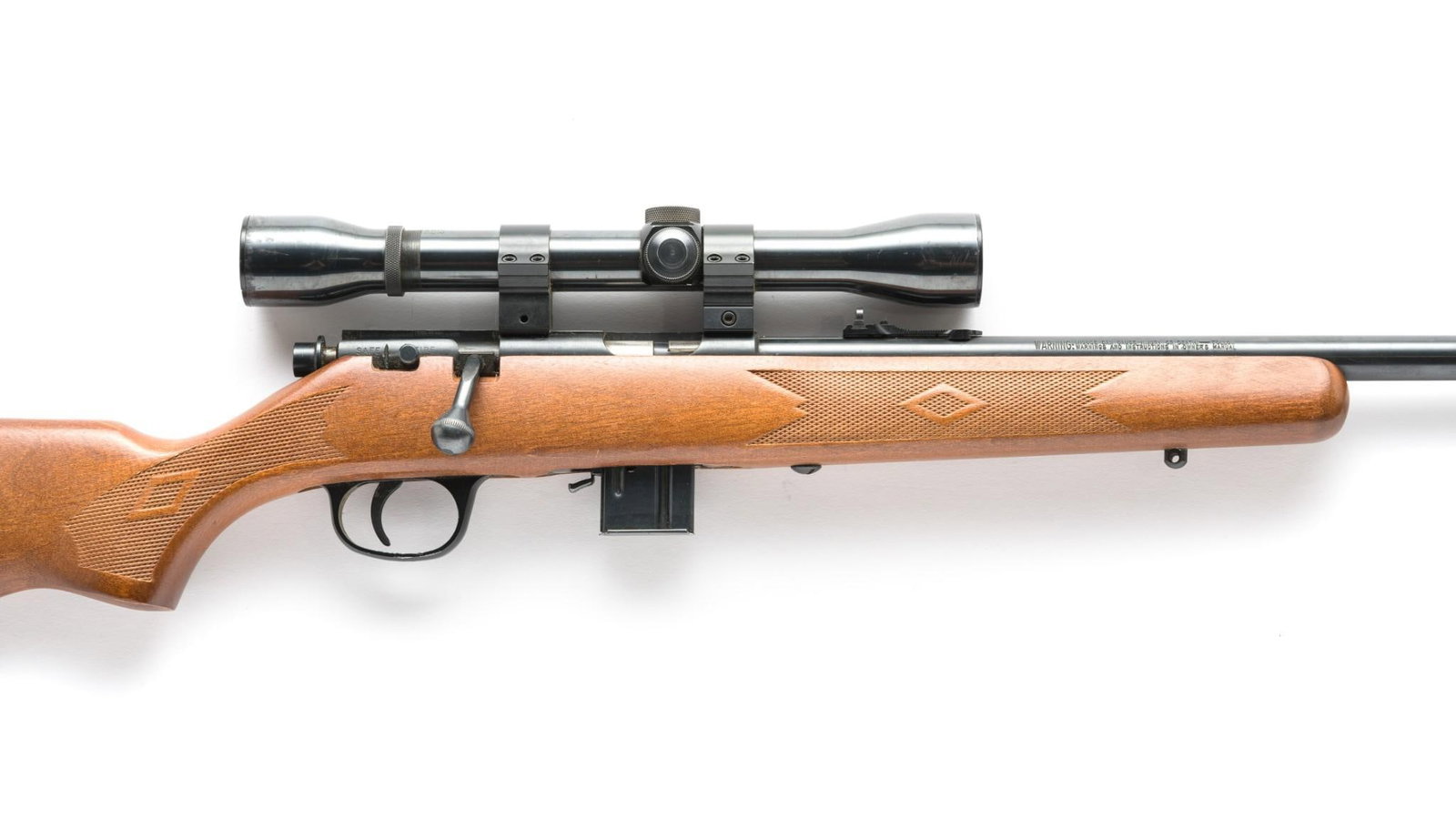 Marlin Model 25MN Bolt Action Rifle w/ Scope, Caliber .22WMR: Serial Number: 01266309 Design: The Marlin Model 25MN is a bolt action rifle with a 22" barrel chambered for the .22 Winchester Magnum Rimfire cartridge. This rifle feeds from a detachable box magazin