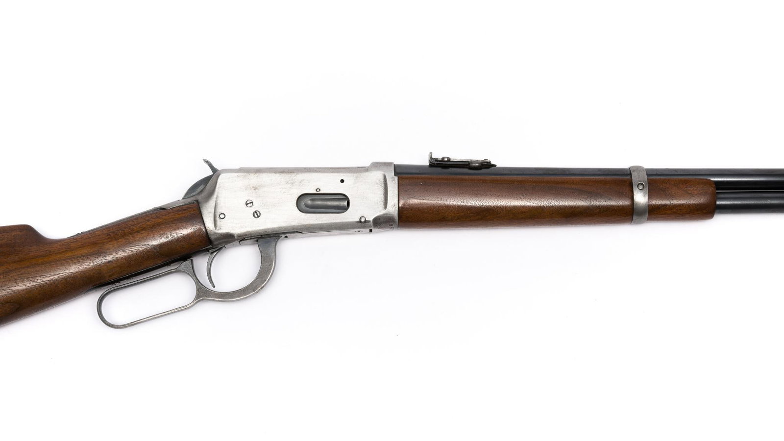 Winchester Model 94 Lever Action Carbine, 30 W.C.F.: Serial No. 966249 Design: Lever action repeating rifle. Nickel steel barrel. With saddle ring. Barrel marked "Manufactured by The Winchester Repeating Arms Co." Condition: Good condition. Inventory No