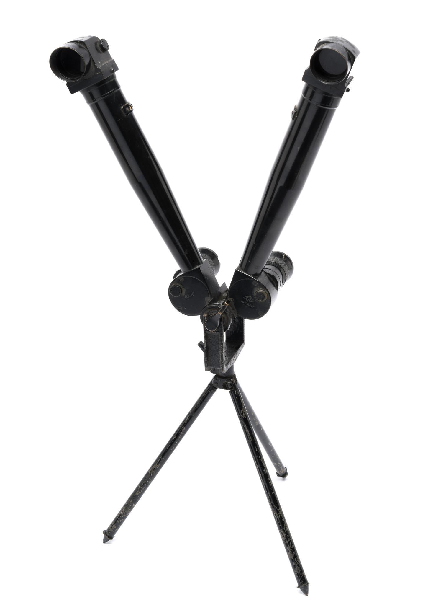 WWII Japanese Artillery Nikko Field Trench Binoculars: DESCRIPTIONS: WWII Japanese Artillery Nikko 8x6 degree field trench binoculars. With tripod still attached to binoculars. MEASUREMENT: Open 9" wide x 21" high.