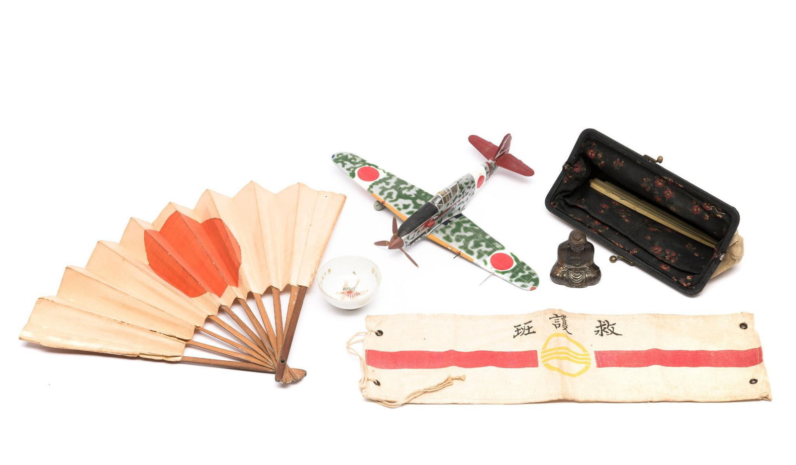 Japanese WWII Head OR Arm Band And Paper Fan: DESCRIPTION: Printed arm or head band, 13 1/2" length, in good antique condition with original grommets, showing aging but no damage. Paper and wood fan, 10" length, still whole and functional with we