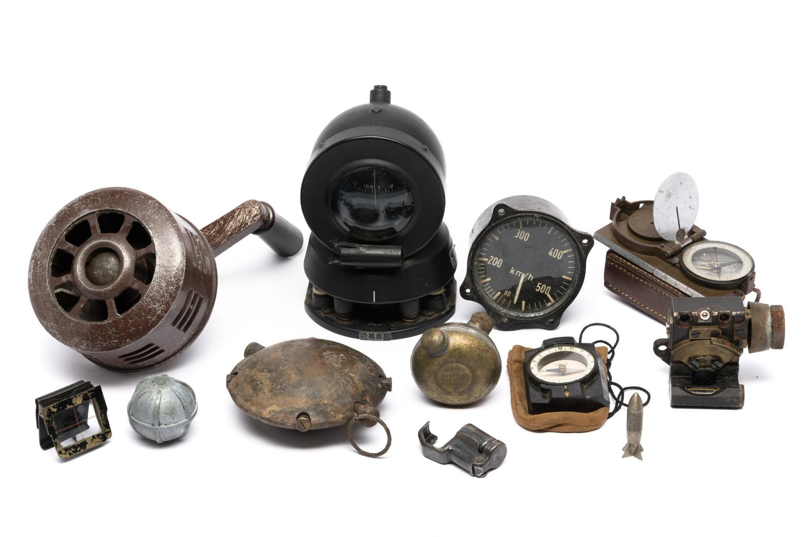 WWII And WWI Japamese German Gage Compass Discus Hand Grenade: DESCRIPTION: Japanese WWII Ki-21 Sally Bomber Mk I Model 2 Compass, Japanese military Hand Compass, German WWI Turtle discus grenade, aircraft speedometer, WWII indexing sighting device, air raid sire
