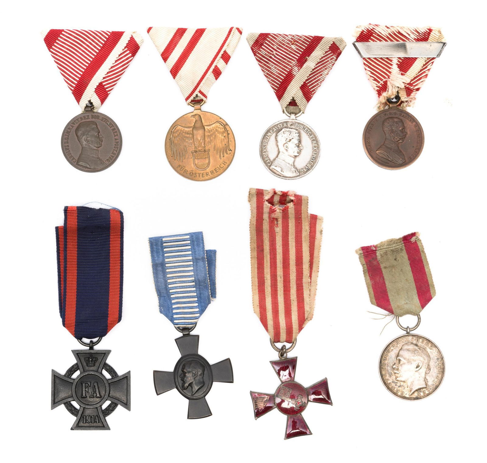 Eight Military Medals WWI Period: DESCRIPTION: Includes Hessian bravery, Bremen WWI, Bavaria 1916 King Ludwig Military, Oldenburg 1914 Freidrich August Kreuz, Austria Medals. MEASUREMENT: Lengths are 2 1/2" to 4 1/2" including the rib