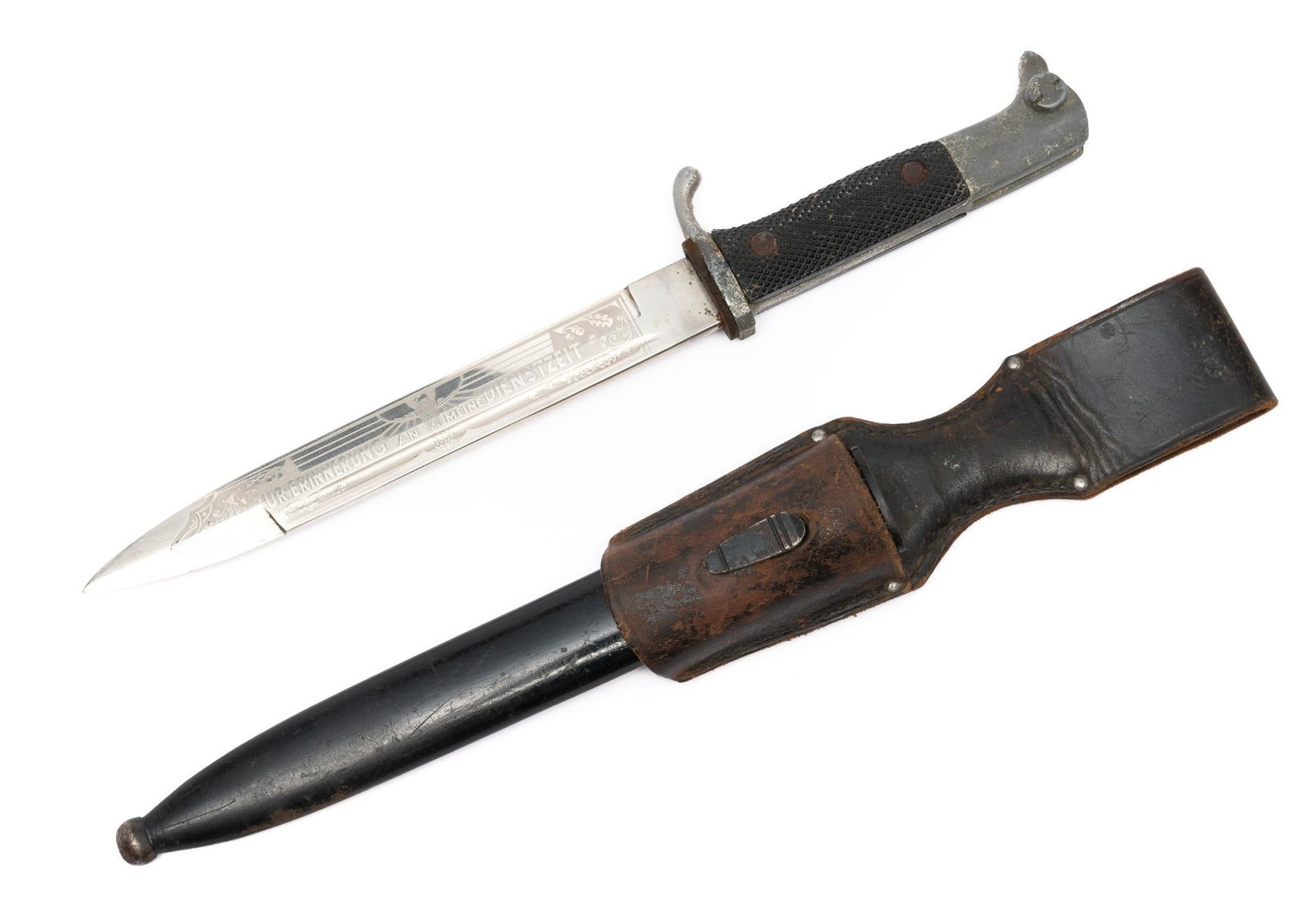 WWII German Dress Bayonet w/ Scabbard: DESCRIPTION: Blade marked Siegried Waffen. Engraved Zur Erinnerung an Meine Dienstzeit (In honor of my service time) and eagle with swastika. MEASUREMENT: Overall with scabbard 13-3/4" long. CONDITION