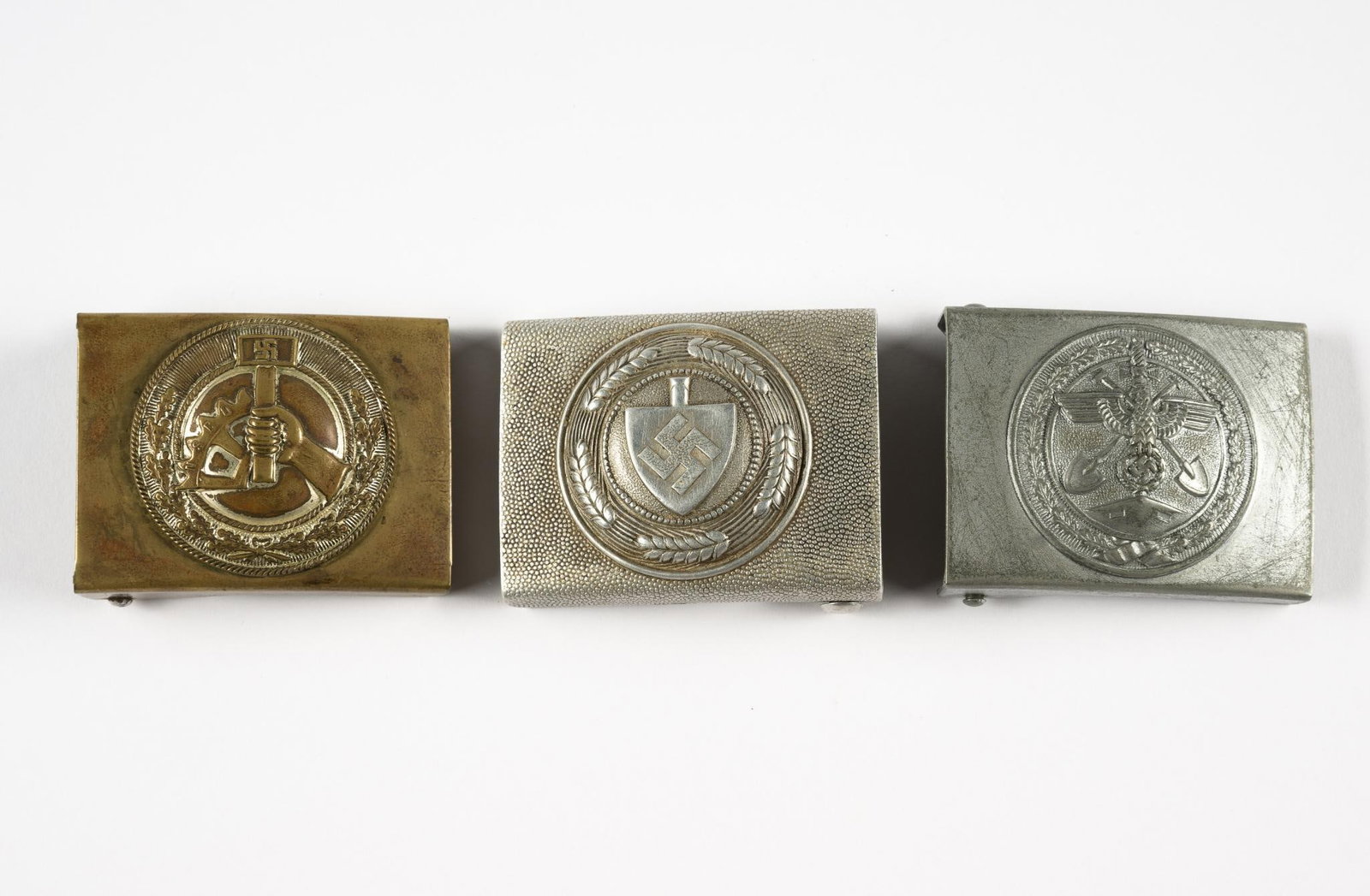 3 World War II German RAD & TODT Belt Buckles: DESCRIPTION: Includes (1) Reichs Arbeits Deienst Bet Buckle and (1) TODT Belt Buckle and (1) National-Socialistiche Betreibs Orgainization Belt Buckle. Two buckles have numbers and letters on back. CO