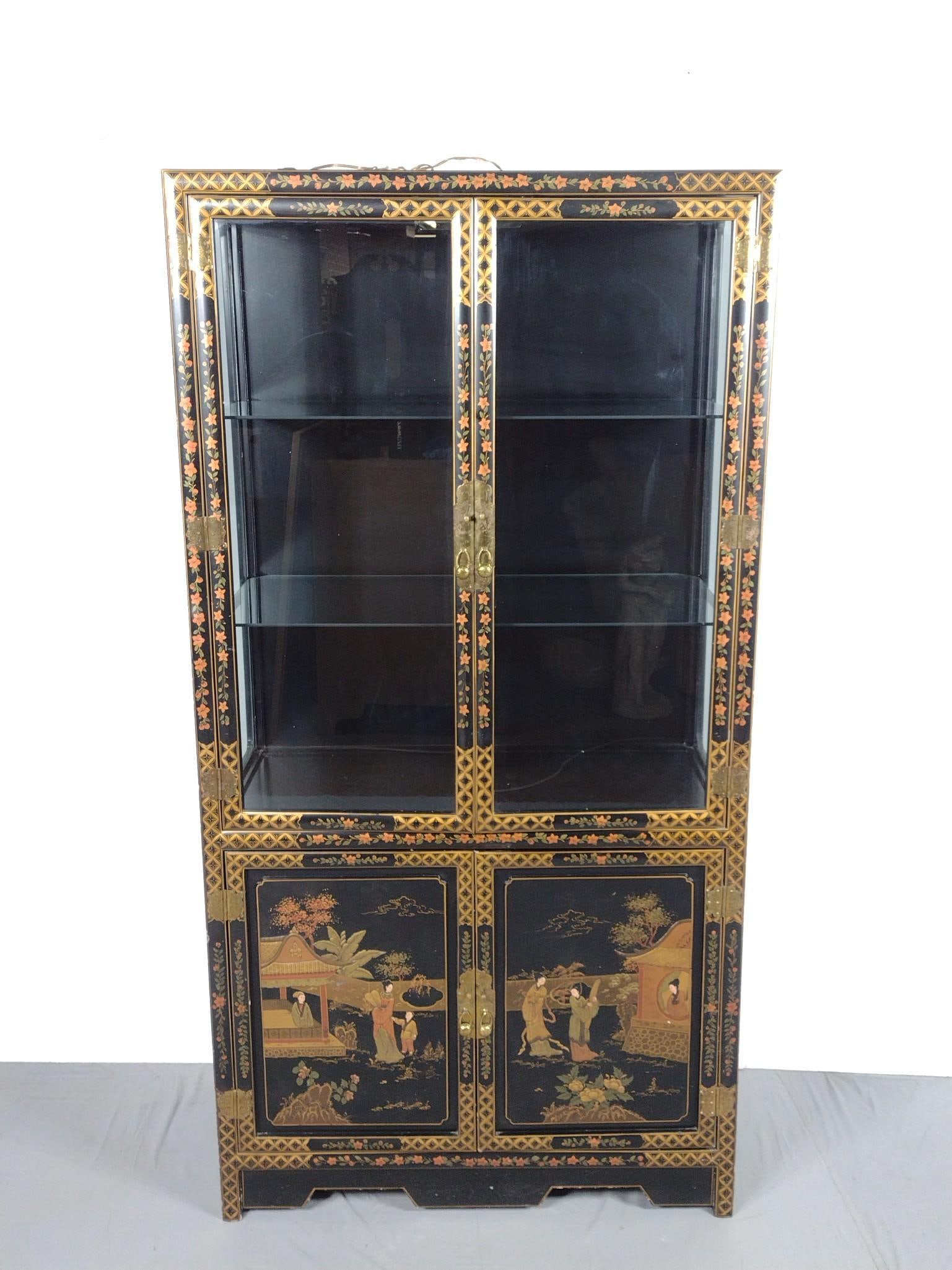 Asian Style Curio Cabinet: NOT ELIGIBLE FOR IN-HOUSE SHIPPING. 36" wide X 17-3/4" deep X 69-3/4" high has a few light scratches. No manufactures name found.