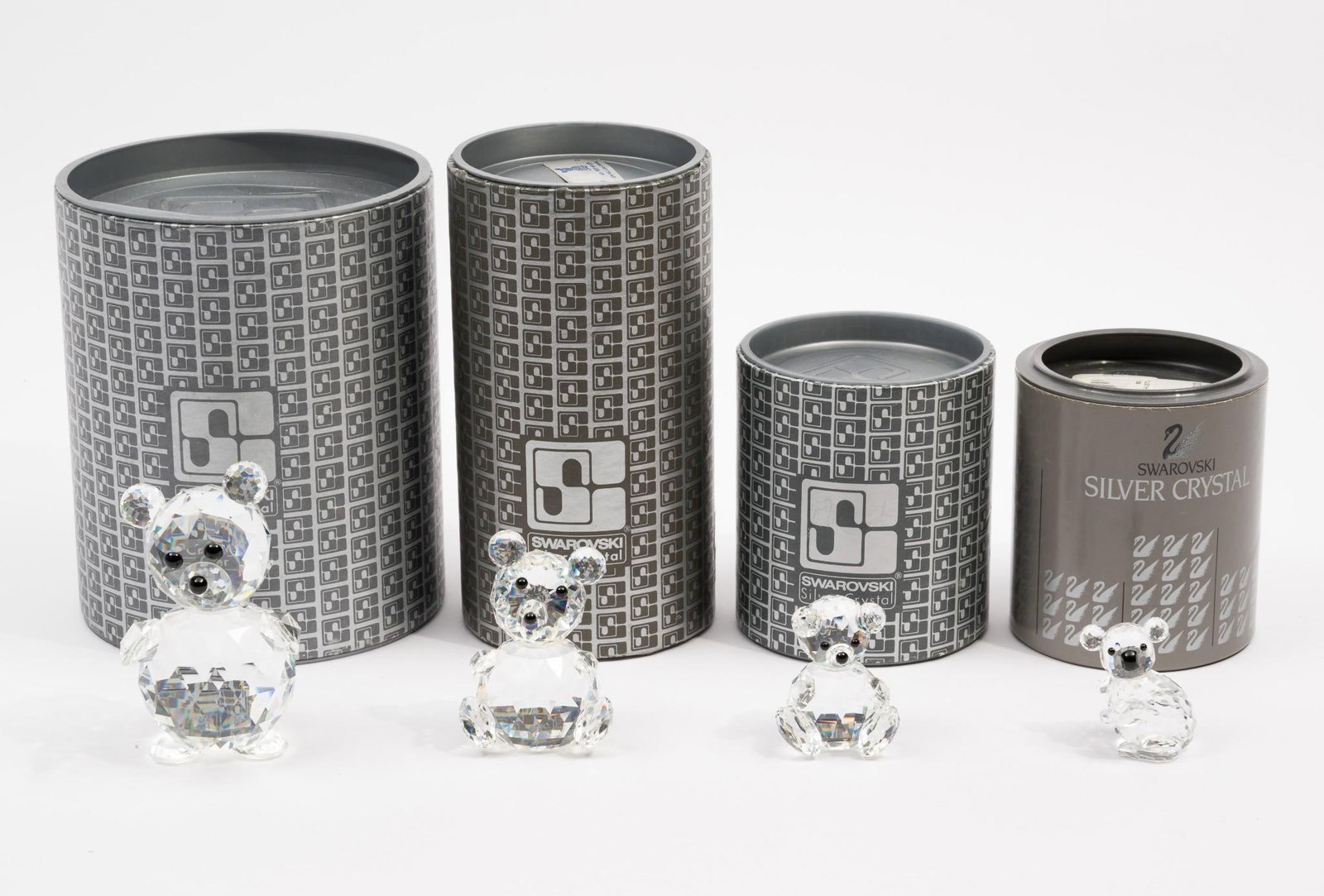 4 Swarovski Figurines incl. Koala Bear: Also includes 3 bears. Figurines measure 1" to 1-1/2" wide x 1-3/4" to 3-3/4" high. Boxes measure 3-1/4" to 5" wide x 3-5/8" to 6" high. All with original boxes.