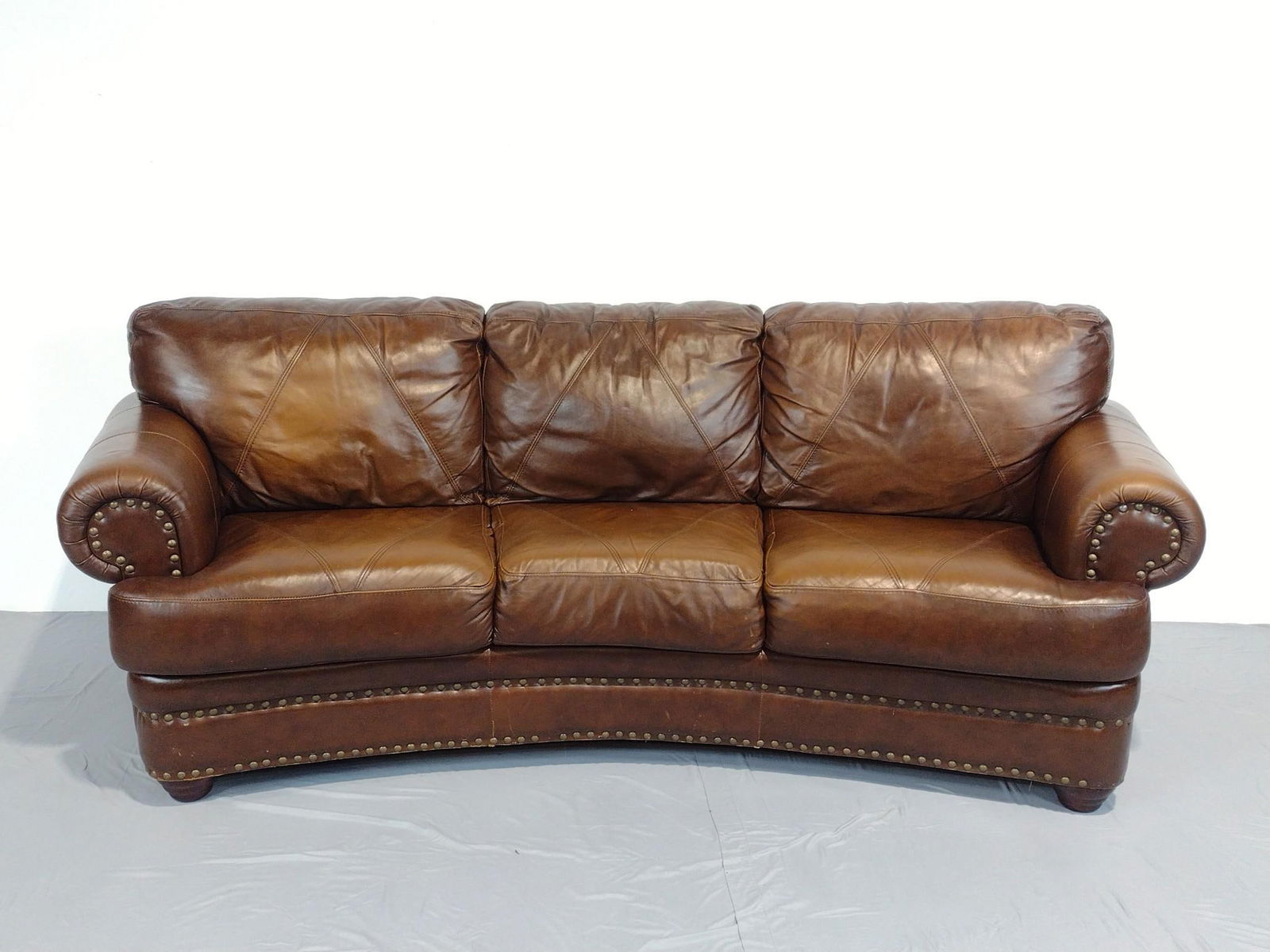 Decoro USA Sofa: NOT ELIGIBLE FOR IN-HOUSE SHIPPING. 94" wide X 40" deep X 35" high. Has a few light scratches.