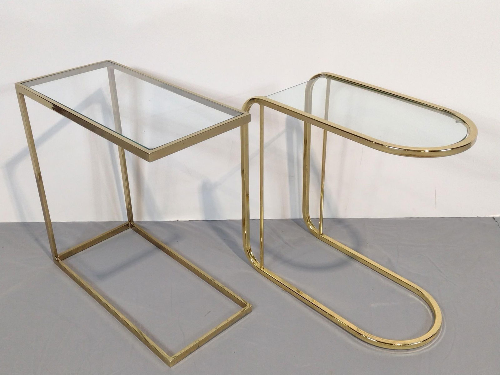 Two Brass & Class Side Tables: NOT ELIGIBLE FOR IN-HOUSE SHIPPING. 10" wide X 20" deep X 19-3/4" to 20-3/4" high.