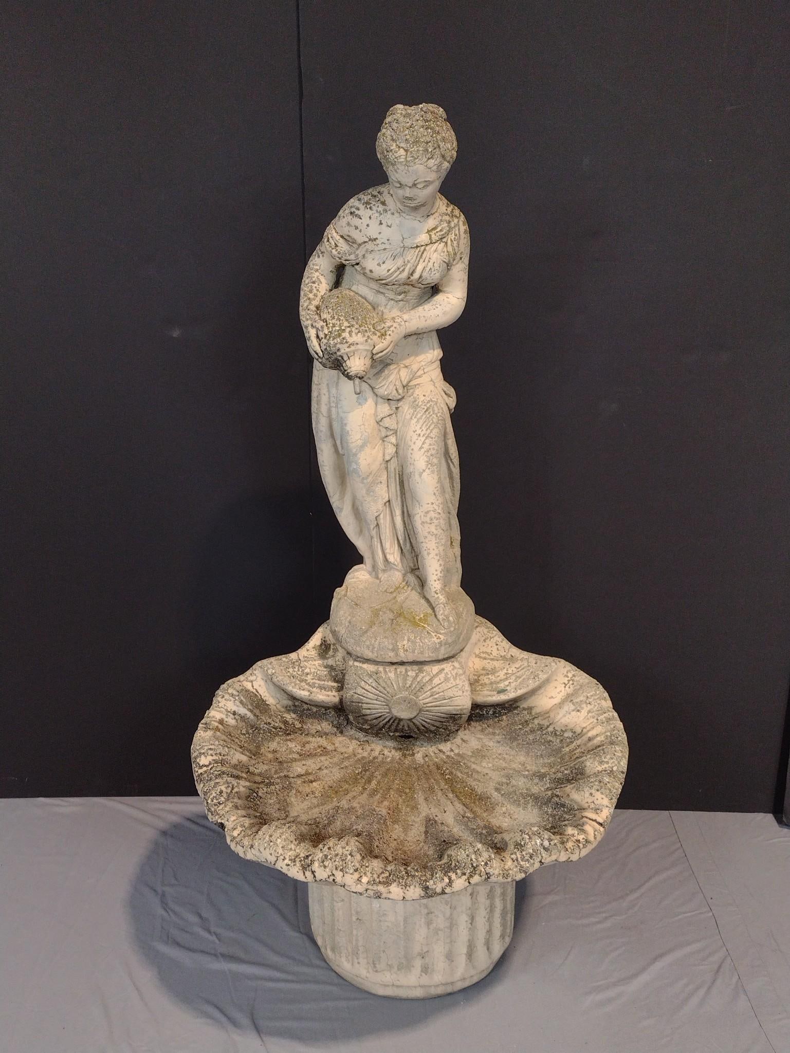 Concrete Figural Fountain: NOT ELIGIBLE FOR IN-HOUSE SHIPPING. 27" wide X 25" deep X 55" high. Has some wear and discoloring.