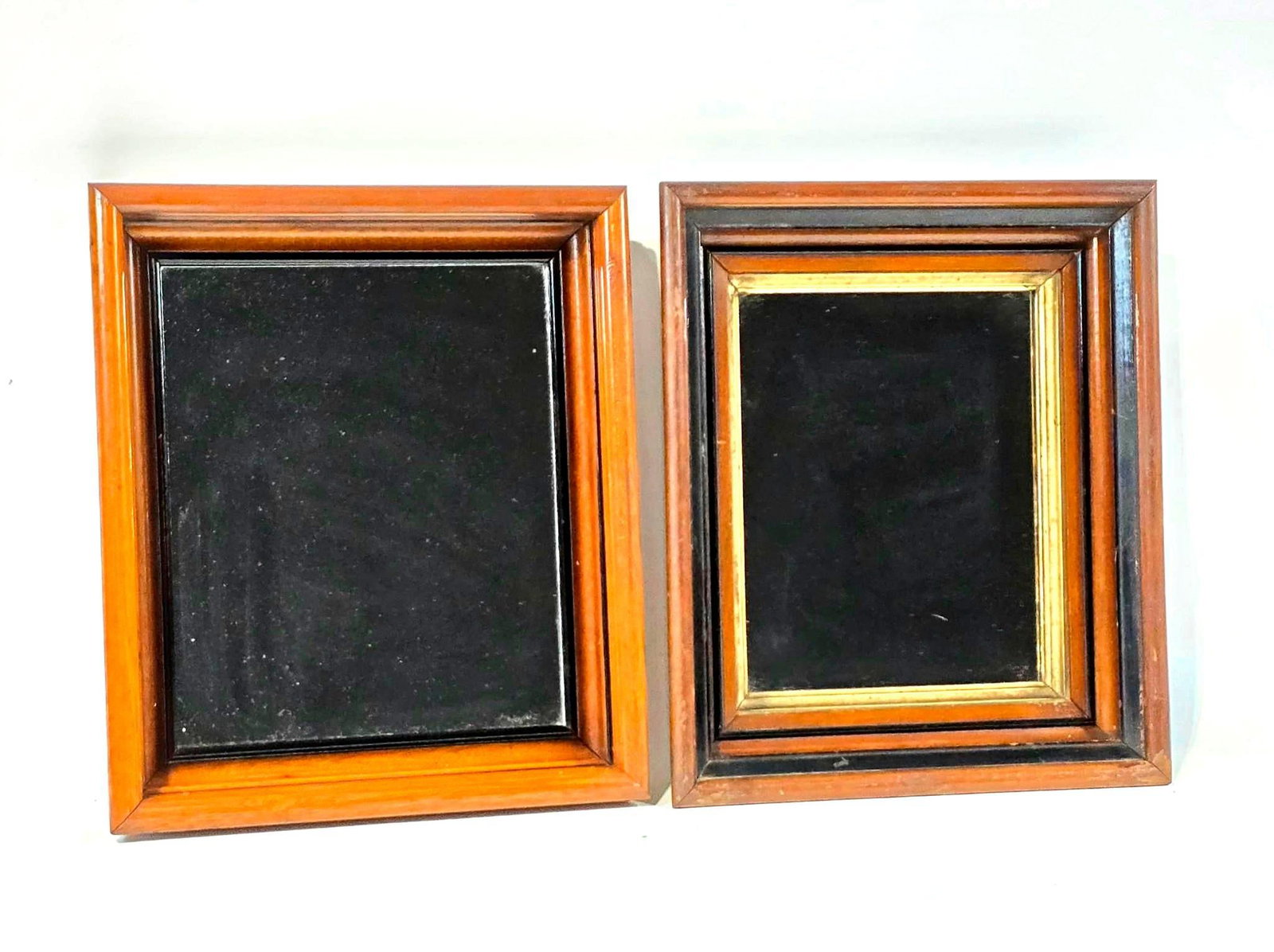 2 Vintage Mirrors: NOT ELIGIBLE FOR IN-HOUSE SHIPPING. Sight: 9-1/2" to 10-3/4" high x 7-1/2" to 9" wide. Overall with frames: 14-1/4" to 14-1/2" high x 12-1/4" wide. Some finish losses to frame.