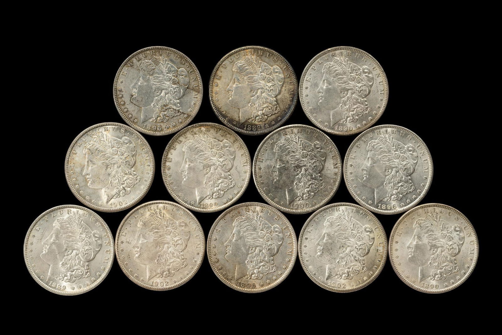 Twelve Uncirculated Morgan Silver Dollars (1 of 2)