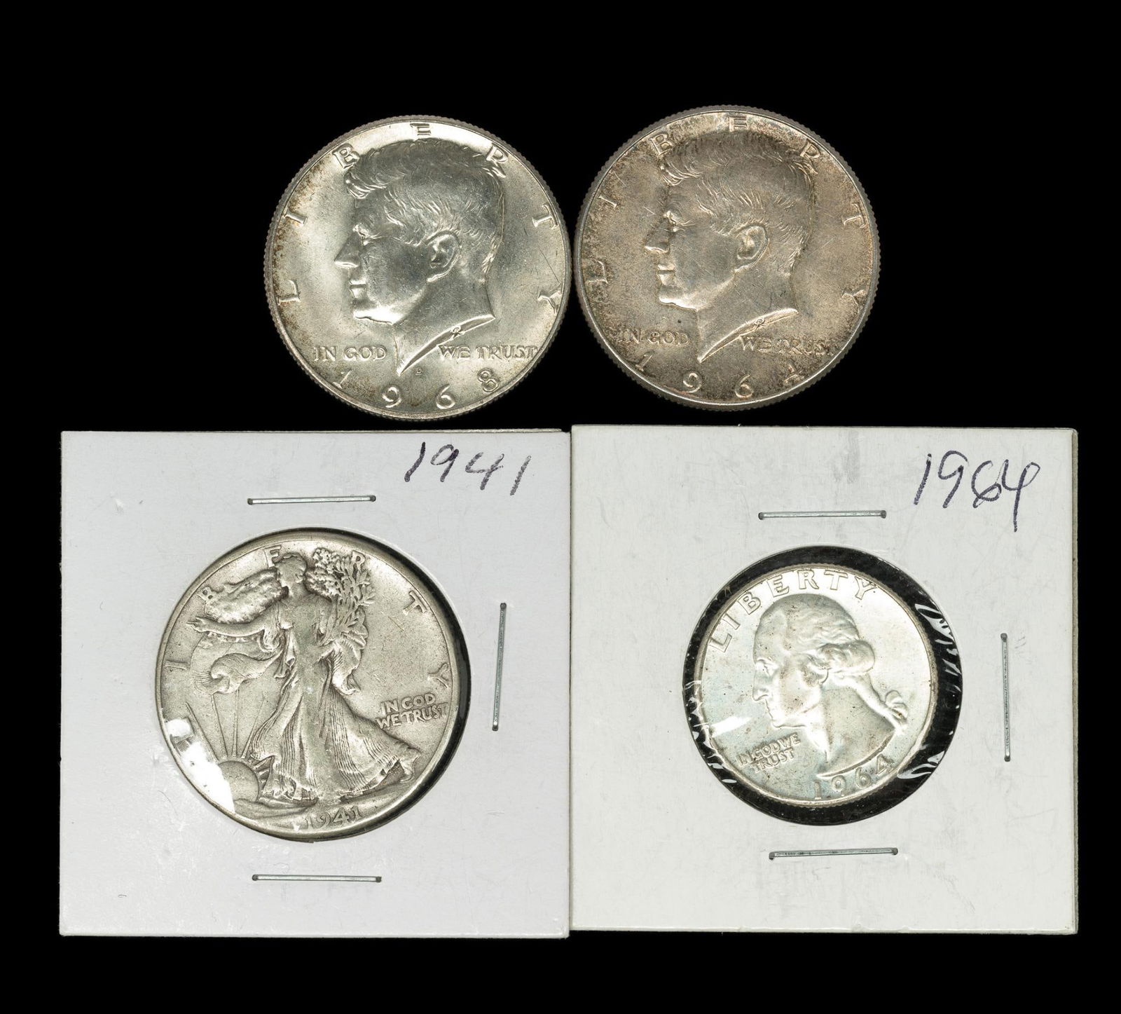 Silver Half Dollars And One Quarter: 1964, 1968 Kennedy halves, 1941 Walking Liberty half, 1964 Quarter.