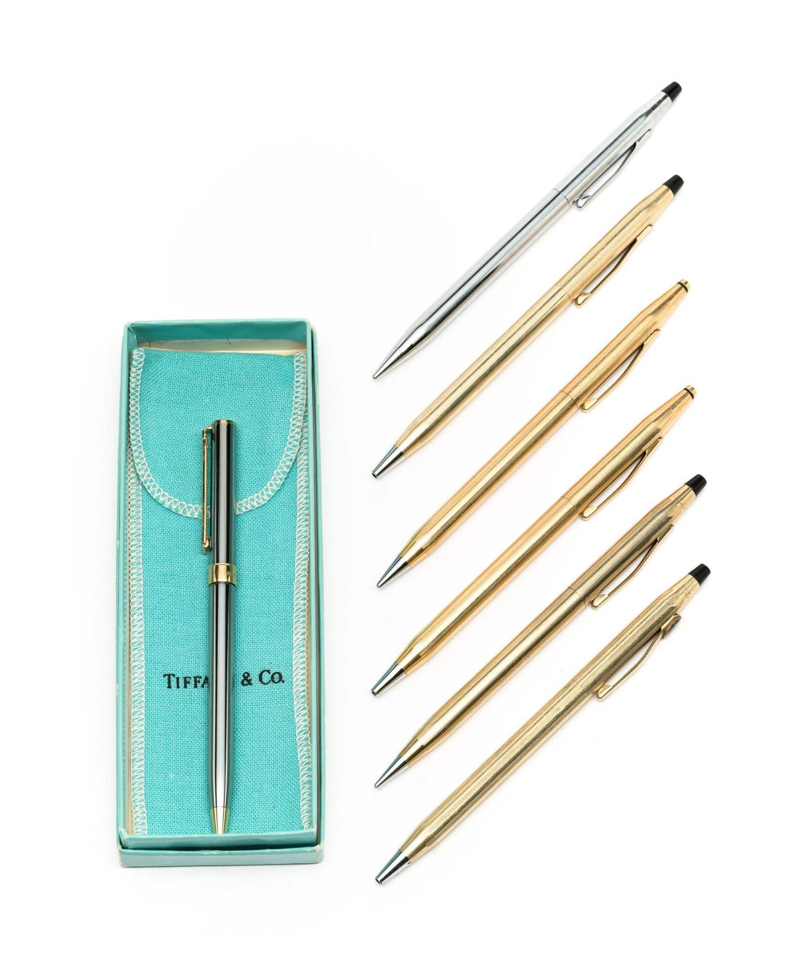 Tiffany T Clip Ball Point Pen And 18K Gold Filled Cross Pens: The Tiffany pen comes with pouch and original box and has gold accents. IOt shows no signs of use and works correctly There are five gold filled Cross pens and pencils, some 18k and some 12k. Also the