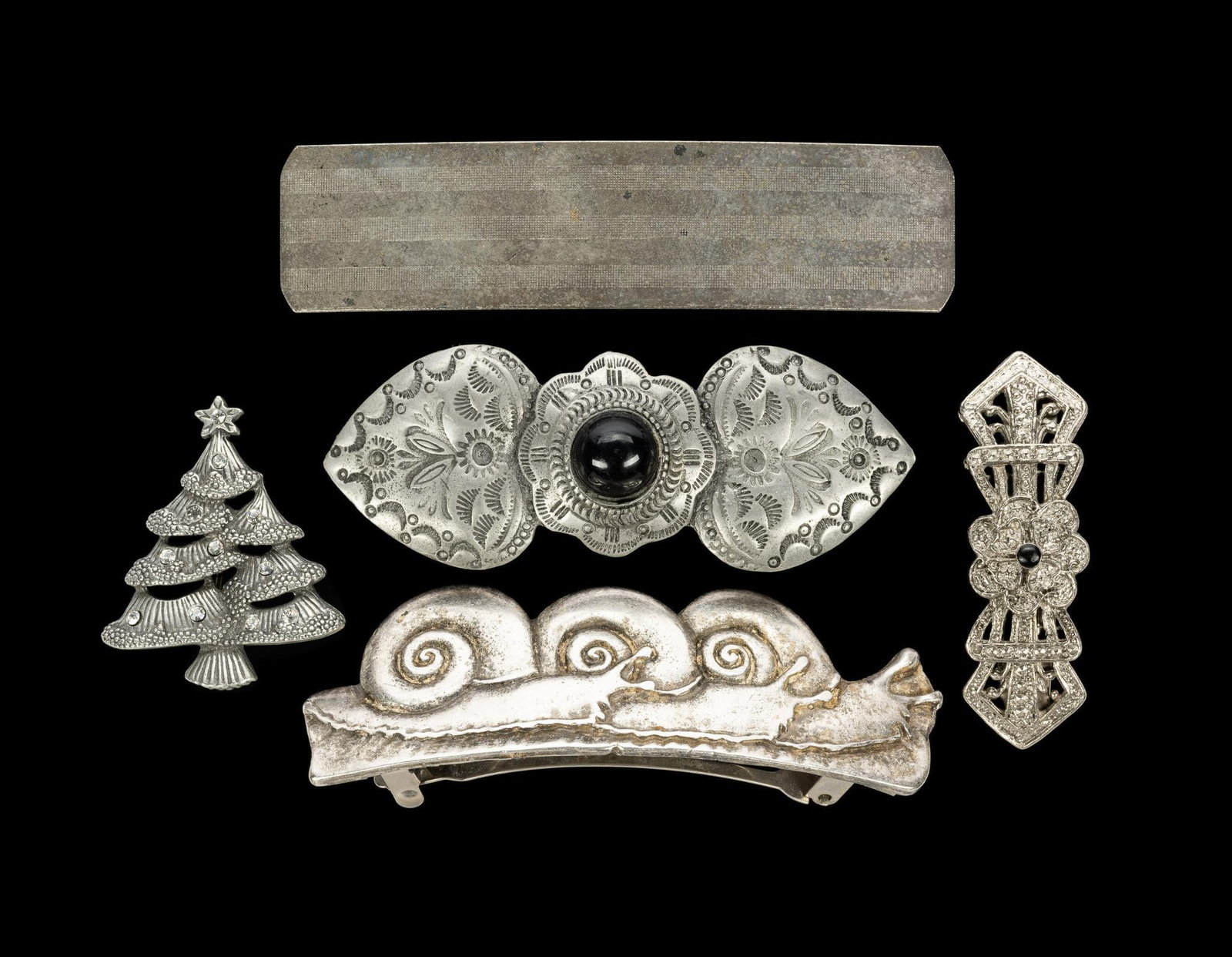 Antique Pewter French Barrette And Others: Four vintage barrettes including one with snails design and apparently a pewter casting is marked Made In France. Three are white metal castings and one hair clip in sheet metal. Also one white metal 