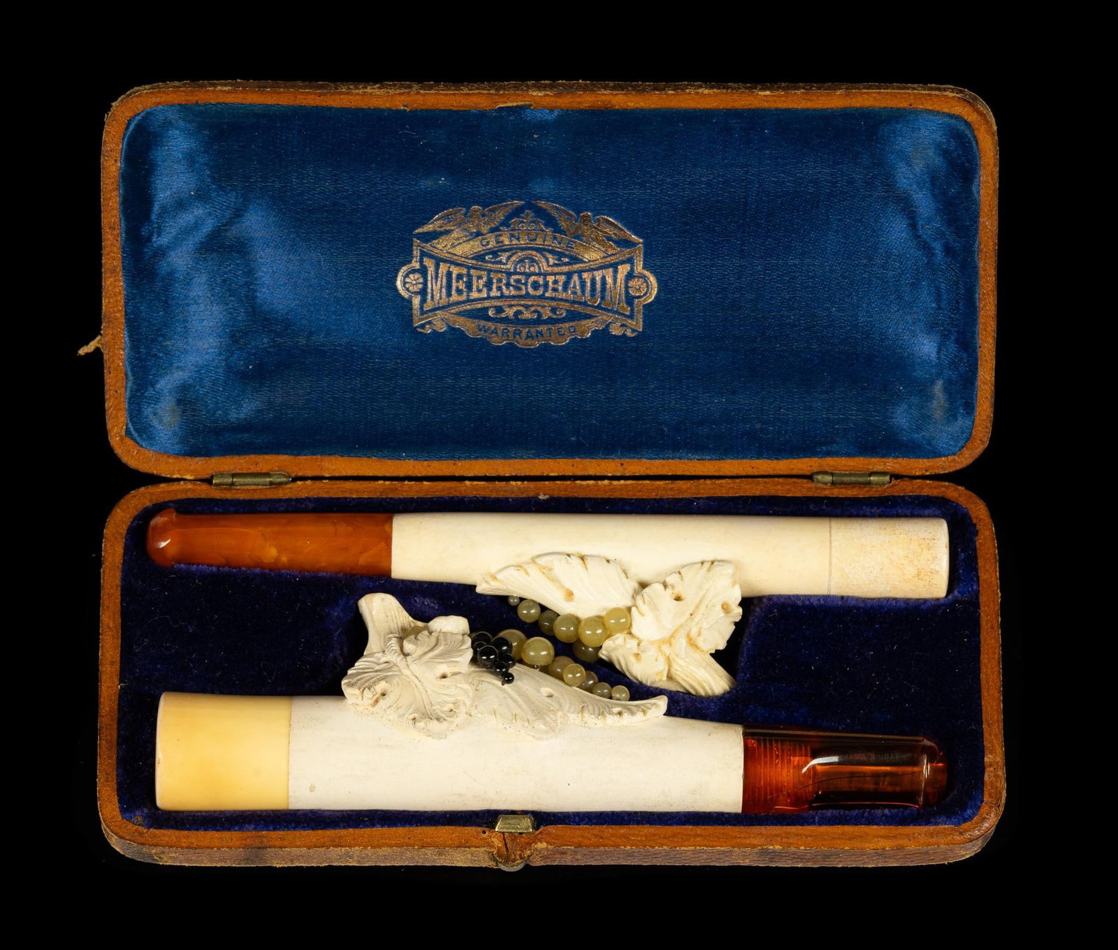 Meerschaum Cigar and Matching Cigarette Holder: Carved and decorated 4" lengths in original case.