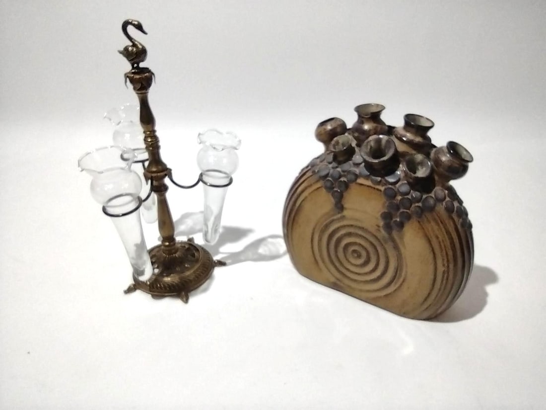 2 Vases: Include bud vase & pottery vase. 6-1/4" to 8-1/4" wide x 8" to 11-1/2" high. One vase missing piece of rim.