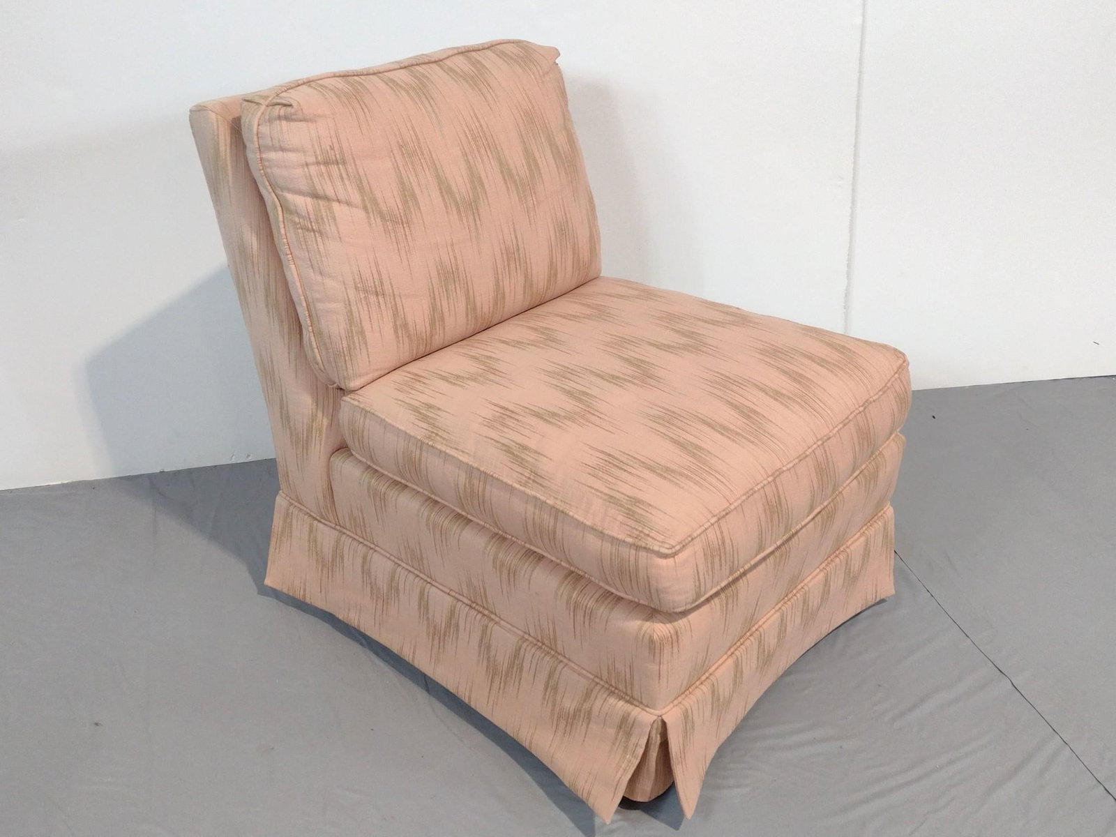 Baker Armless Upholstered Chair: NOT ELIGIBLE FOR IN-HOUSE SHIPPING. 24" wide X 32" deep X 31" high.