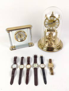 6 Men's Wristwatches and 2 Desk Clocks: Watches include Bulova, Sports Illustrated, Phasar, Seiko, and Nautica. Clocks: Danbury and Kundo. Kundo anniversary clock with plastic globe. 6-3/4" to 12" high.