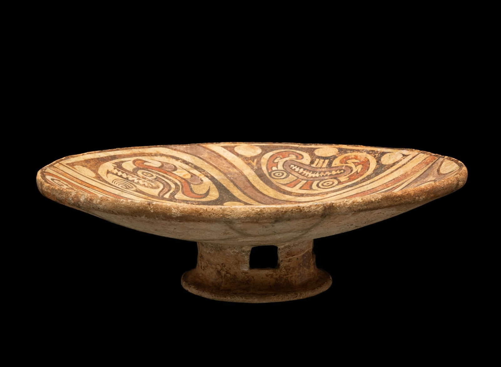 Pre Colombian Central Panama Gran Cocle Pedestal Bowl (600 AD to 1200 AD): DESCRIPTION: Gran Cocle Culture (Central Panama, 600-1200 AD) dish with cut-outs to the foot of the bowl. Highly decorative pattern with purple, black, and red pigment. PROVENANCE: Collected in the 19