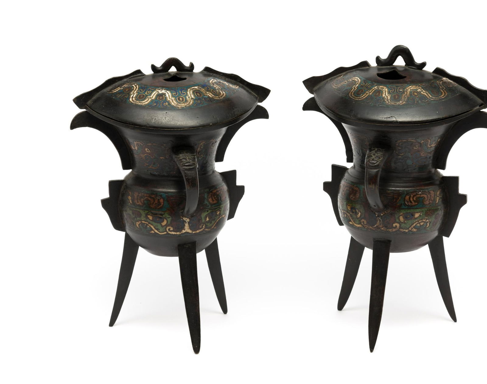 2 Antique Chinese Cloisonne Tripod Jia Vessel: DESCRIPTION: Copper Chinese tripod Jia vessel with a single handle. Three conical legs hold lower bowl section. With lids. The body is decorated with cloisonne enamel. Jia is a Chinese ritual vessel t