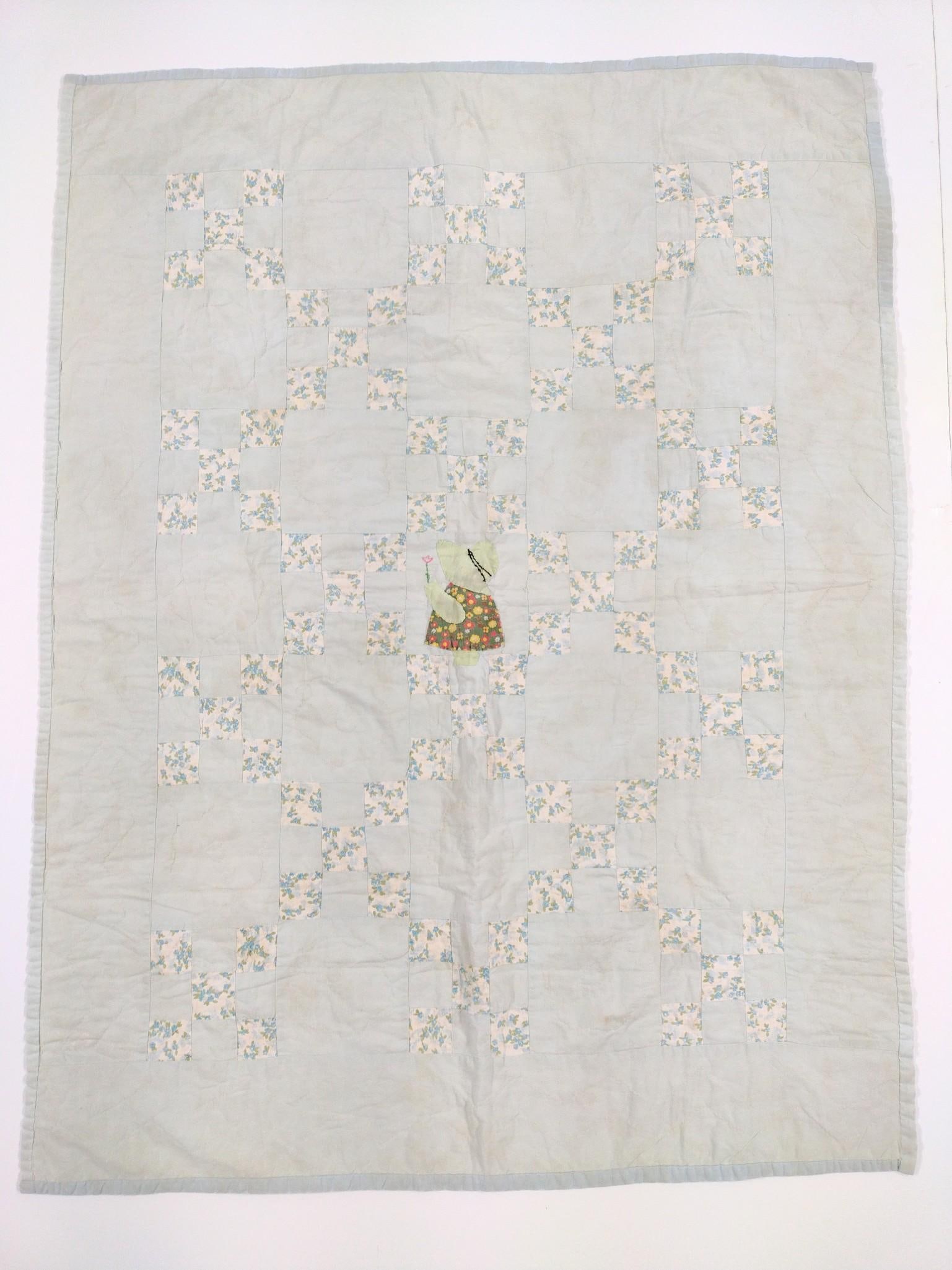 Vintage Sun Bonnet Baby Crib Quilt: 37" wide x 49" long. Some areas of discoloration.