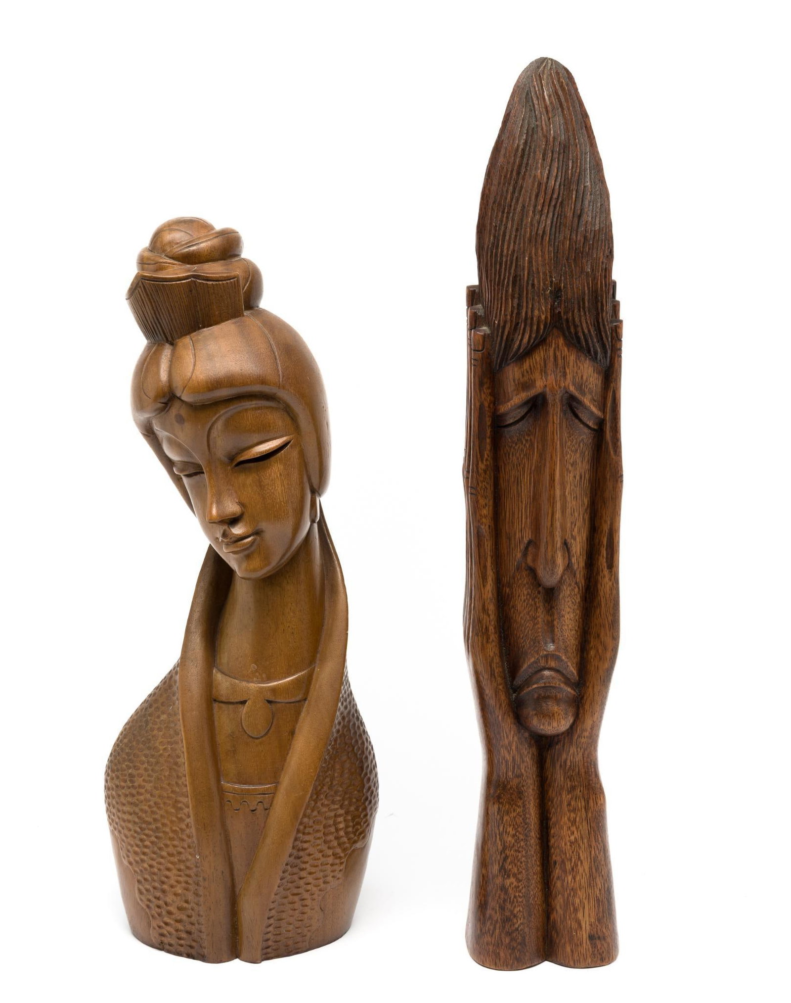 2 Carved Wood Heads: Includes Polynesian female bust and one tribal head. 3-1/2" to 7" wide x 18" to 22-1/2" high.