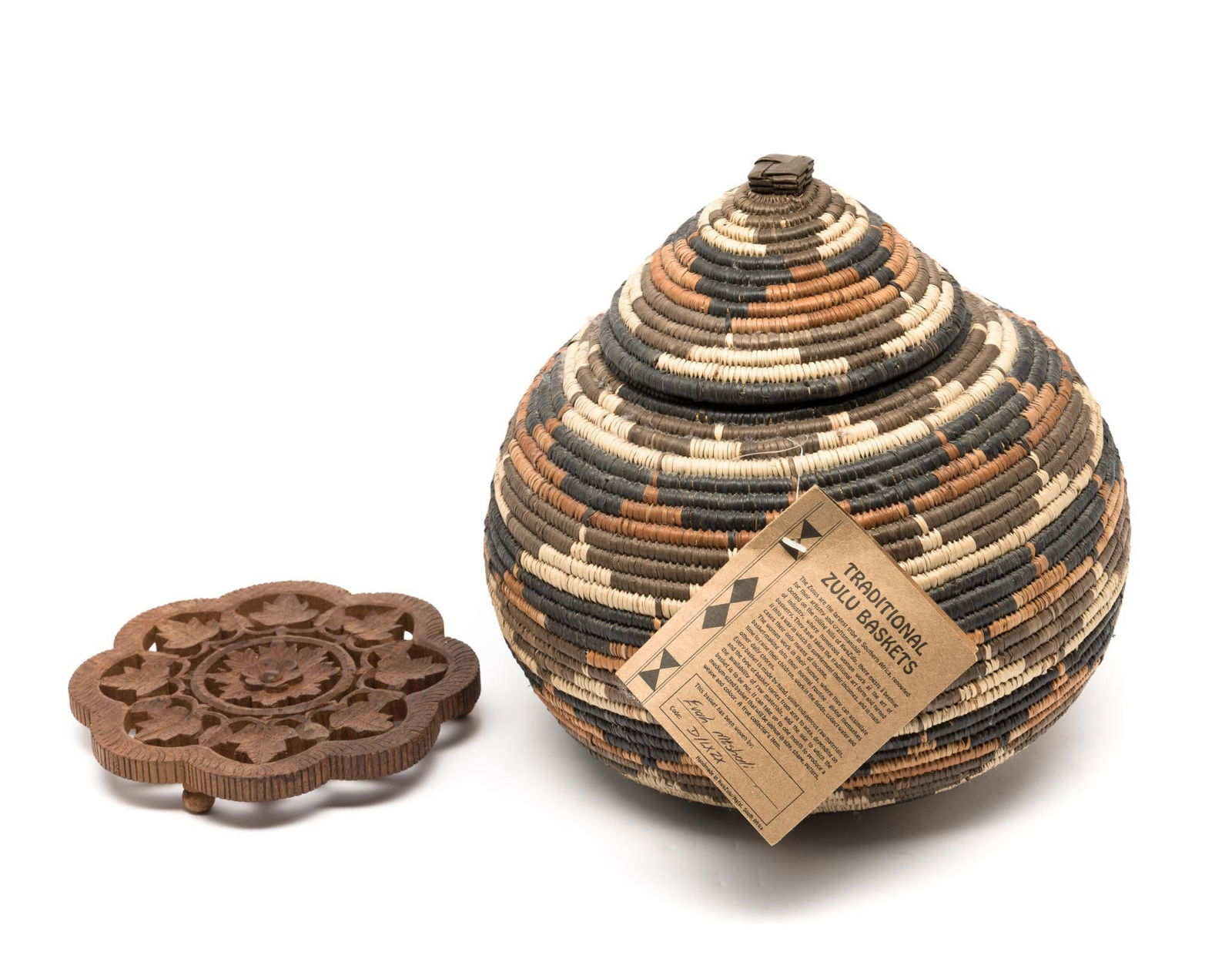 Traditional Zulu Basket & Wood Trivet: Basket: 10-1/2" diameter x 10-1/2" high. Trivet: 7" diameter.