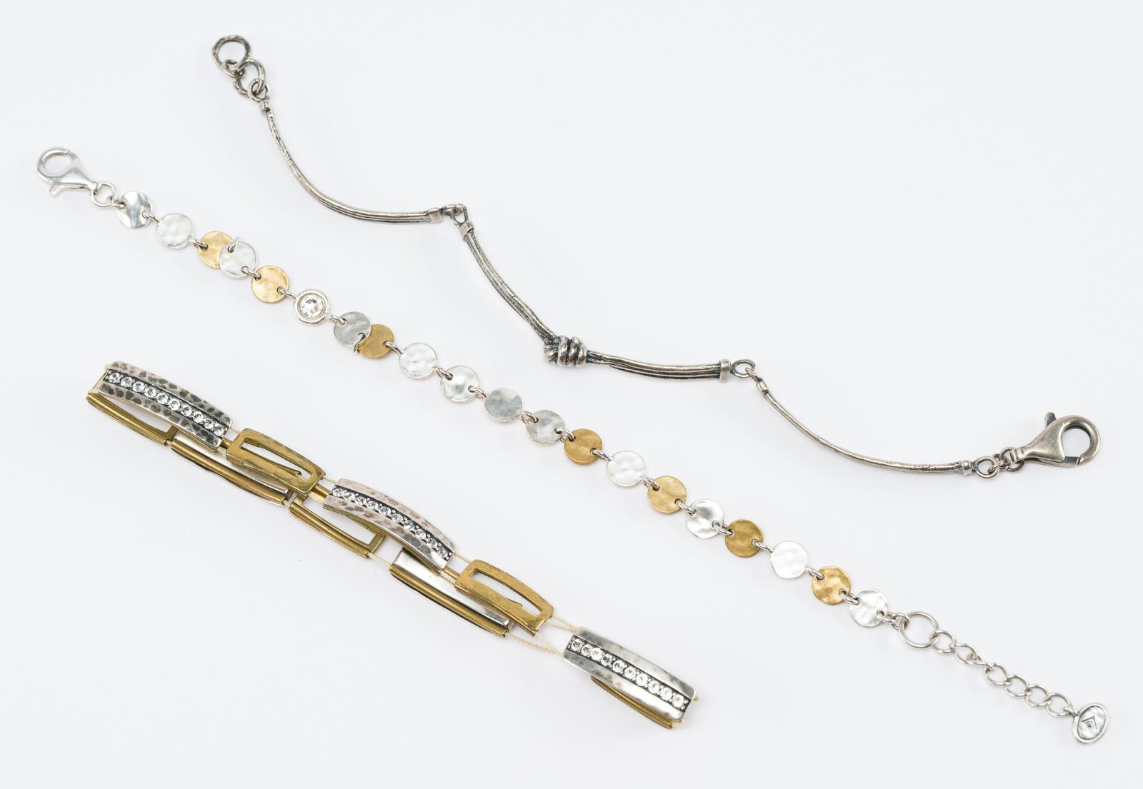 3 Silpada Sterling Silver Bracelets: Marked 925 sterling silver, two with brass accents. Stretch bracelet needs new elastic. 7" to 8" long.