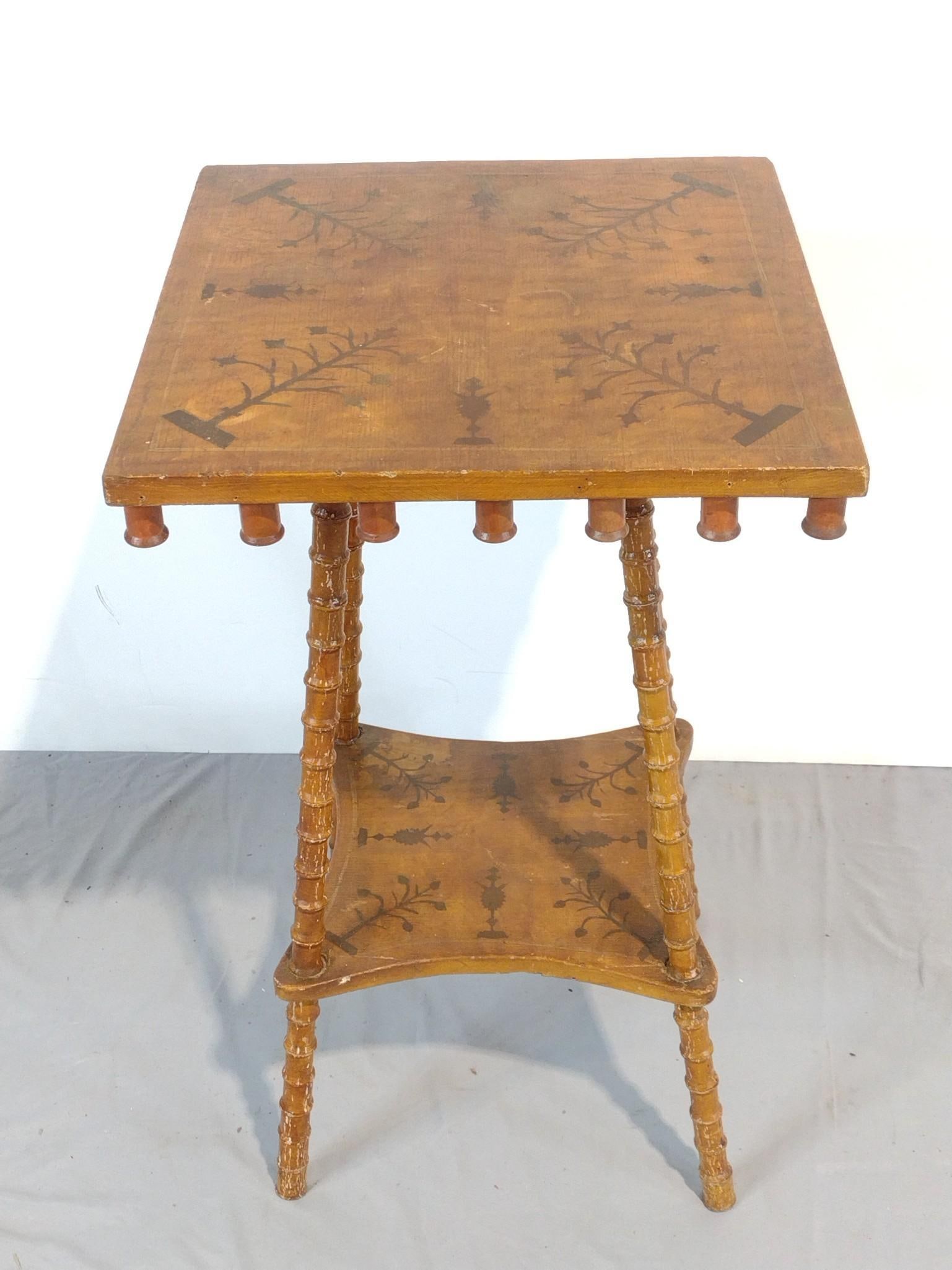 Decorated Spool Table: NOT ELIGIBLE FOR IN-HOUSE SHIPPING. 16-1/4" wide X 16-3/4" deep X 28" high. Has some scratches and finish loss. PROVENANCE: This lot was consigned by the former Double Eagle Antiques on North Second S