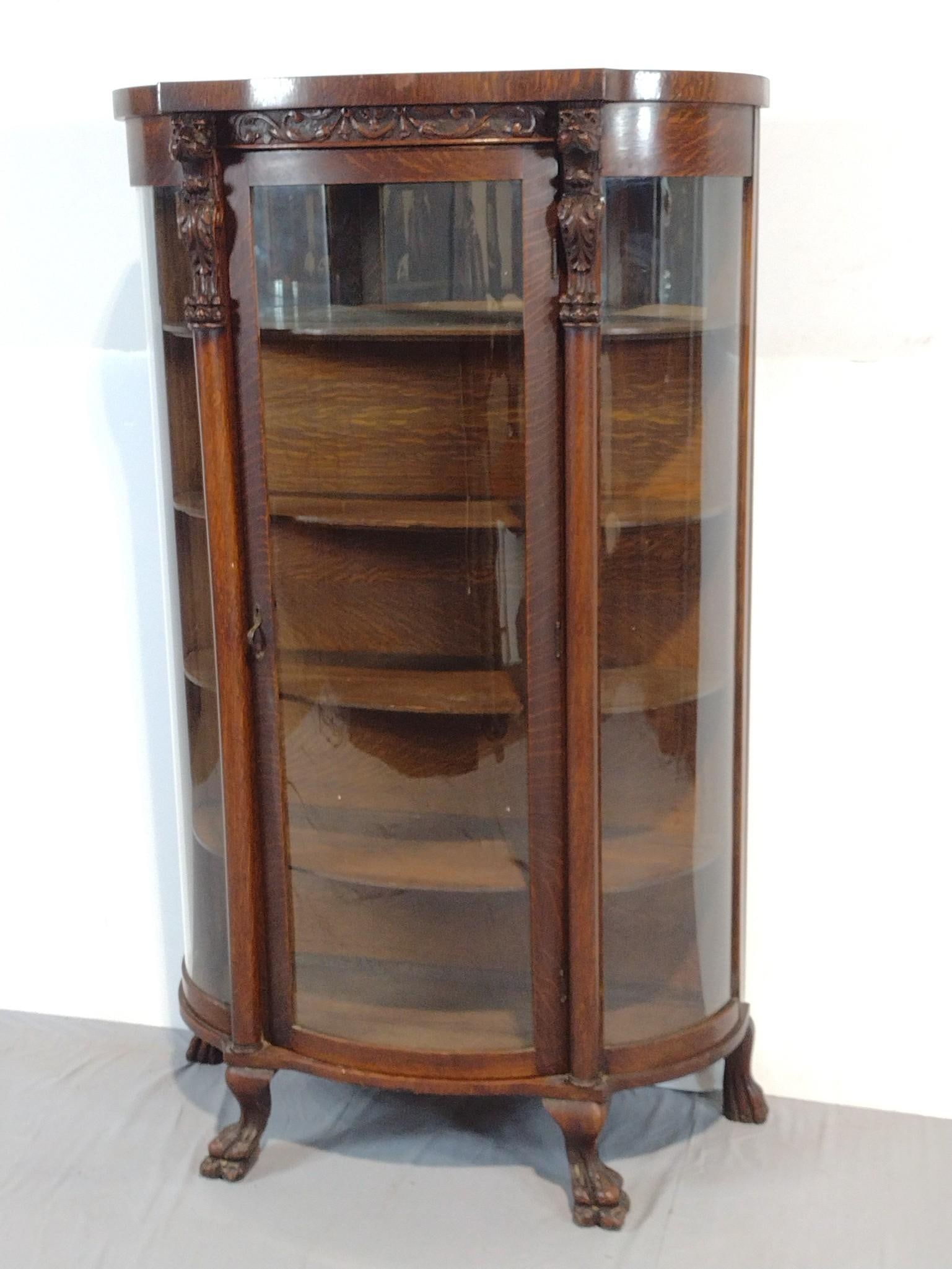 Bow Front Cabinet: NOT ELIGIBLE FOR IN-HOUSE SHIPPING. 38" wide X 15" deep X 64" high. Has wear consistent with age. PROVENANCE: This lot was consigned by the former Double Eagle Antiques on North Second Street in Harri