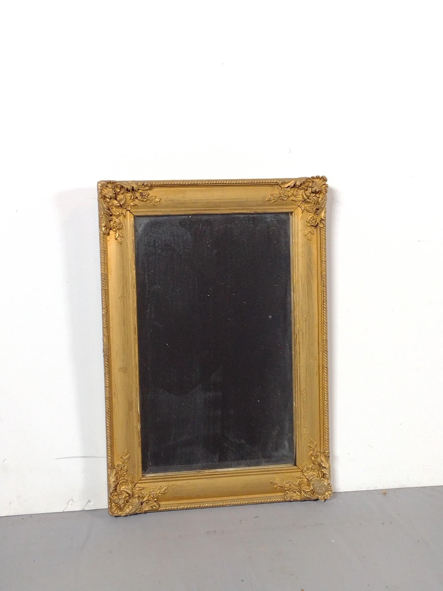 Gilt Framed Mirror: NOT ELIGIBLE FOR IN-HOUSE SHIPPING. Overall 19-3/4" long x 13-5/8" wide. Wear to frame. PROVENANCE: This lot was consigned by the former Double Eagle Antiques on North Second Street in Harrisburg, PA.