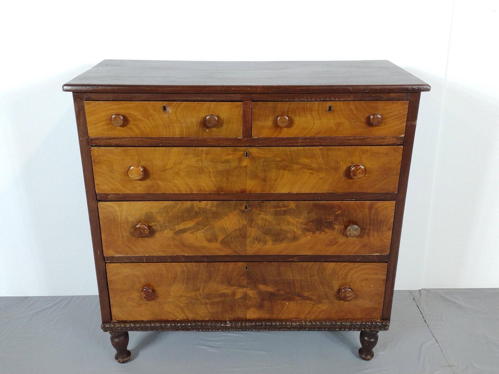 Two Over Three Chest Of Drawers: NOT ELIGIBLE FOR IN-HOUSE SHIPPING. 40" wide X 18" deep X 40" high. Has some scratches and areas of finish loss. Legs have repair.