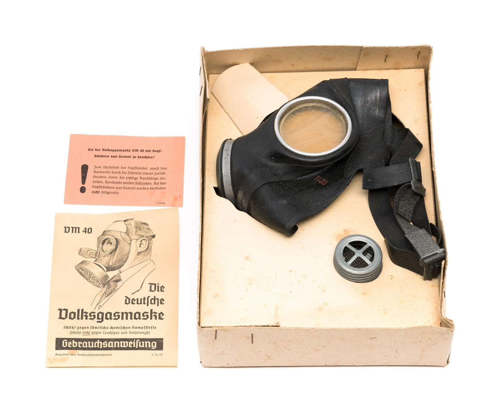 German WWII Civil Defense VM 40 Gas Mask: Civil Defense VM 40 gas mask. Comes with original box and paperwork. Box is 11 1/2" X 8" X 2 1/2".