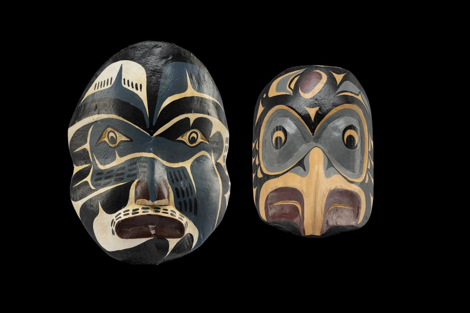 2 Cecil Dawson Cedar Masks: Cecil Dawson is a Kwakwaka'wakw Story Teller and a Hereditary Chief. Life, nature, and ancestral history remain an inspiration for his work. From private collection. Bought at Vancouver Island Art Auc