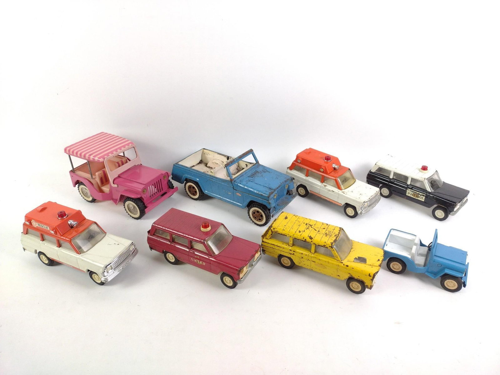 8 Vintage Tonka Trucks incl Patrol: NOT ELIGIBLE FOR IN-HOUSE SHIPPING. 6-1/4" to 12-1/2" long. All with varies degrees of paint loss, rust, and general wear.