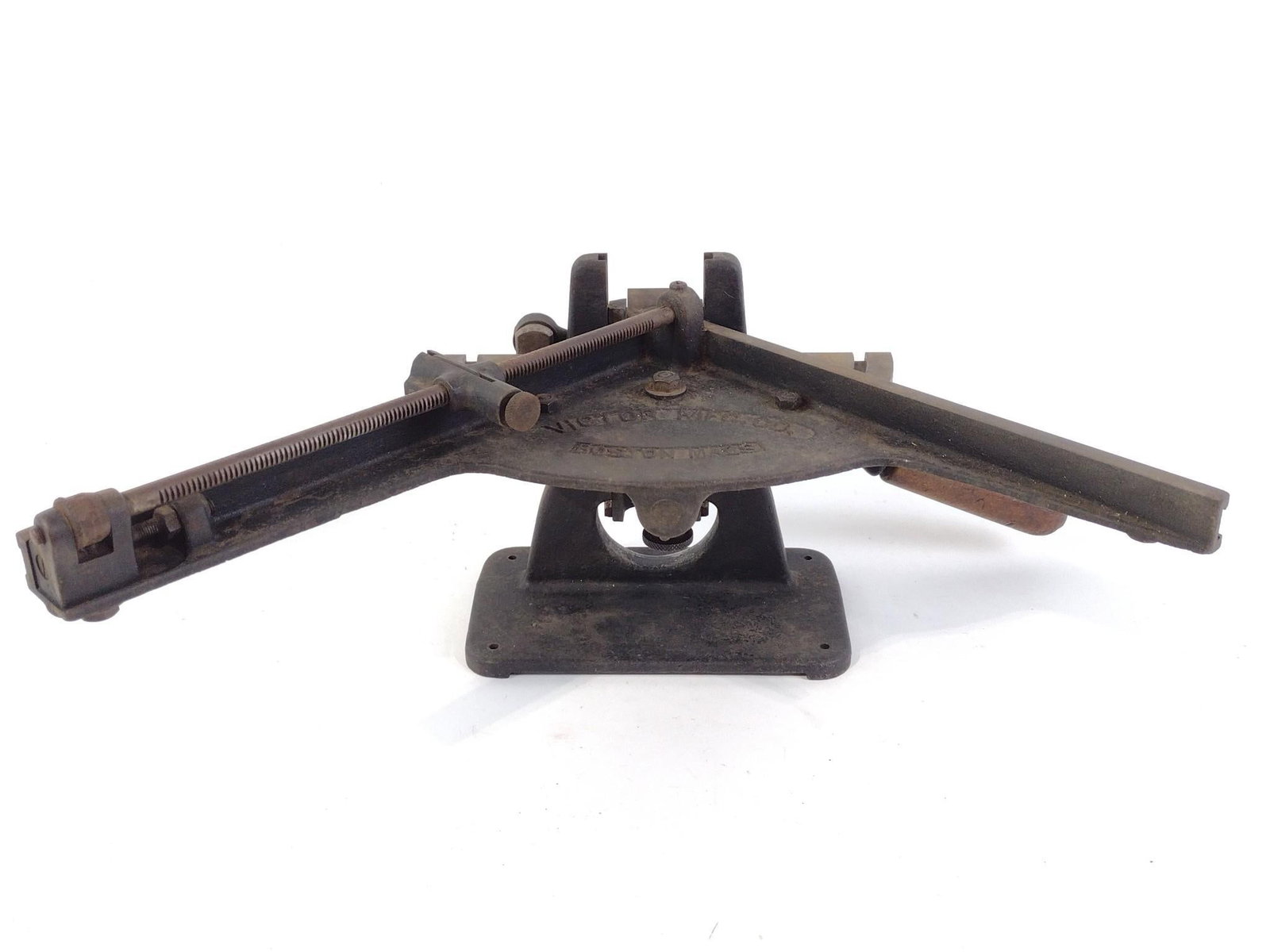 Antique Victor Mgf Co Angle Tool: 17" wide x 14" deep x 8" high. Some wear consistent with age and use.