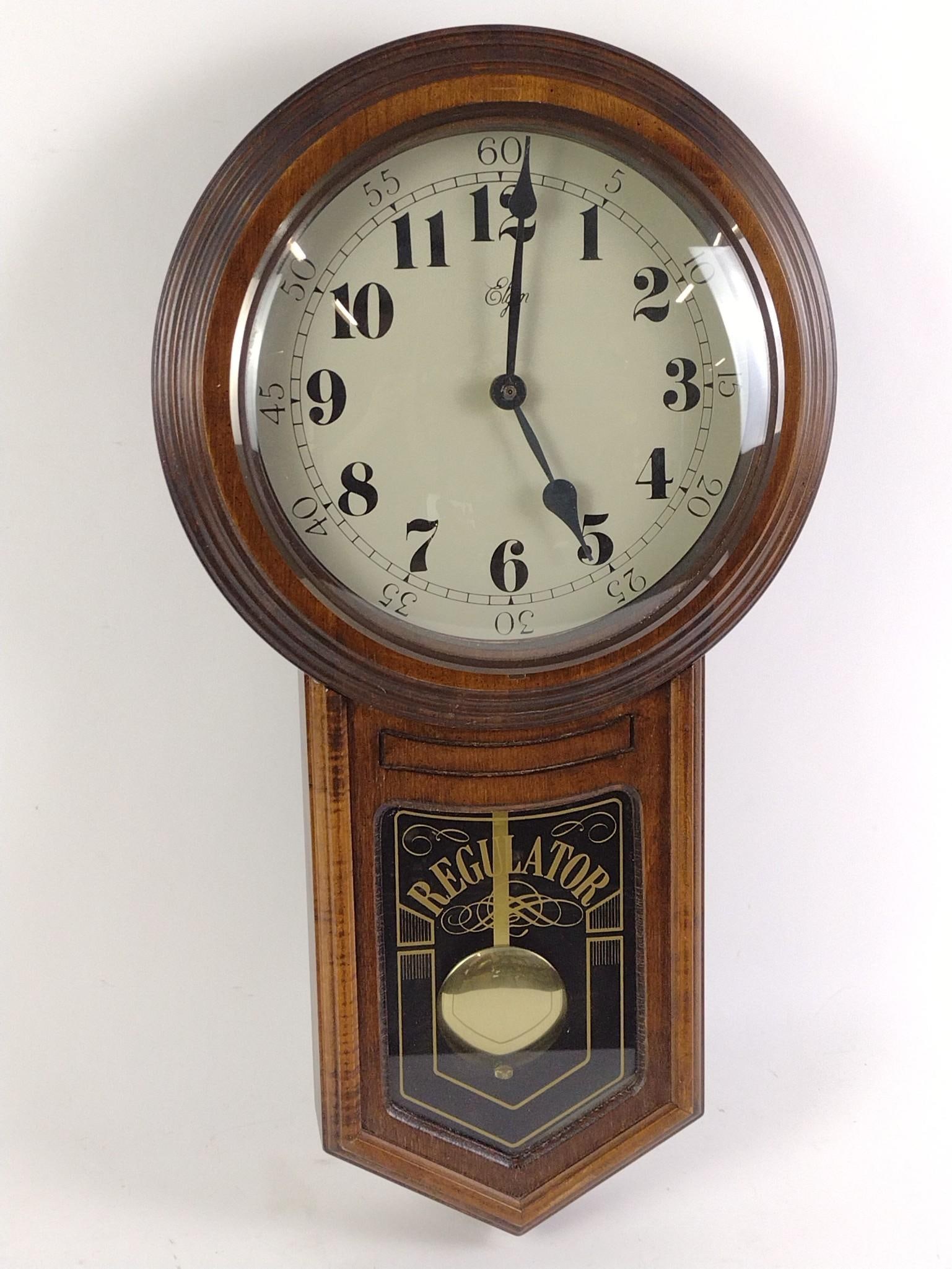 Regulator Wall Clock: NOT ELIGIBLE FOR IN-HOUSE SHIPPING. 13" wide X 3-1/2" deep X 23-1/2" high.