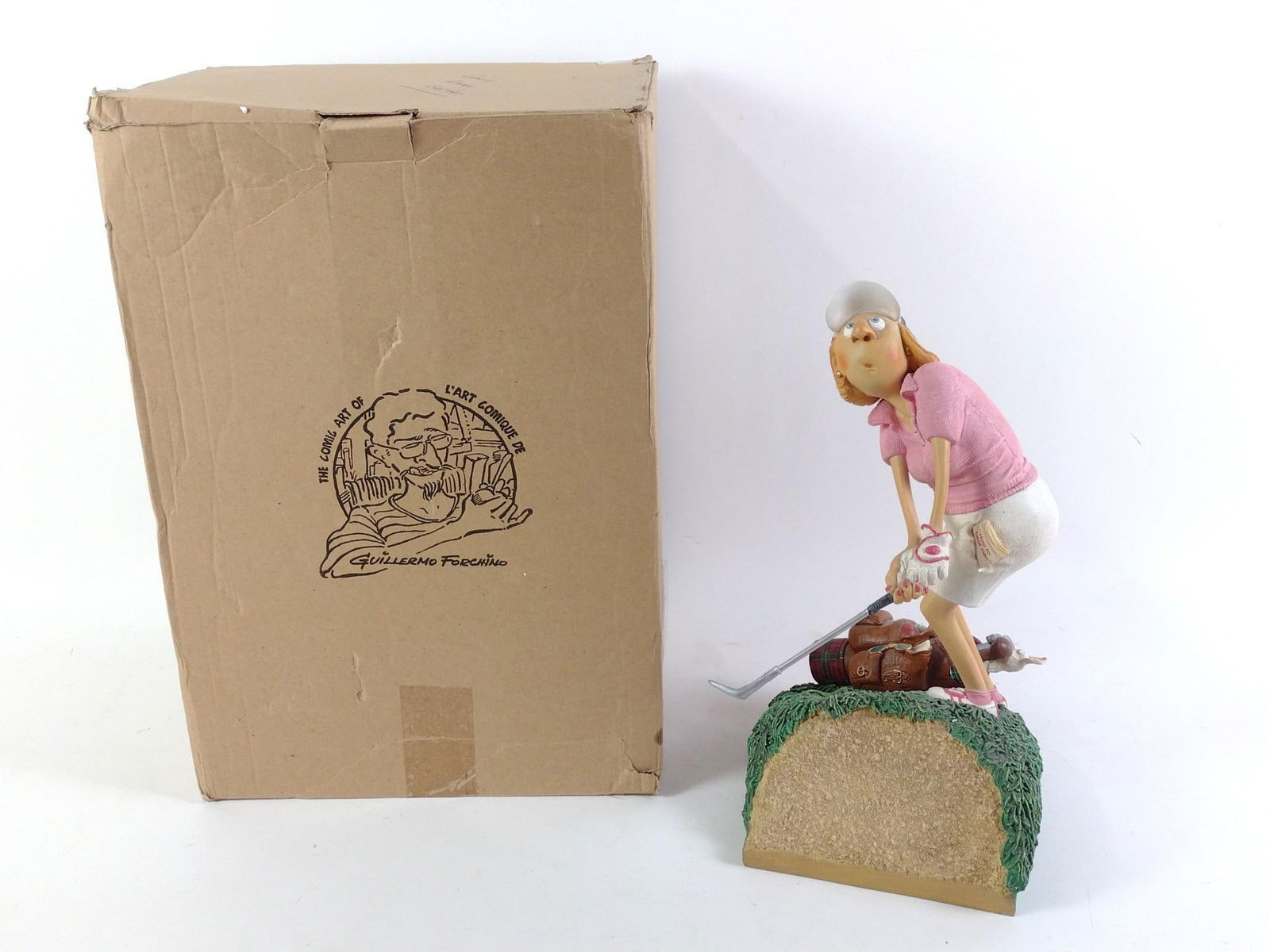 Guillermo Forchino "La Golfeuse" (Lady Golf) Ltd Ed Figurine: Original box included. Edition number 00443. Designed in France. Overall: 7-1/2" wide x 8" deep x 14-1/2" high. "How to beat men" book sculpted in golfers pocket.