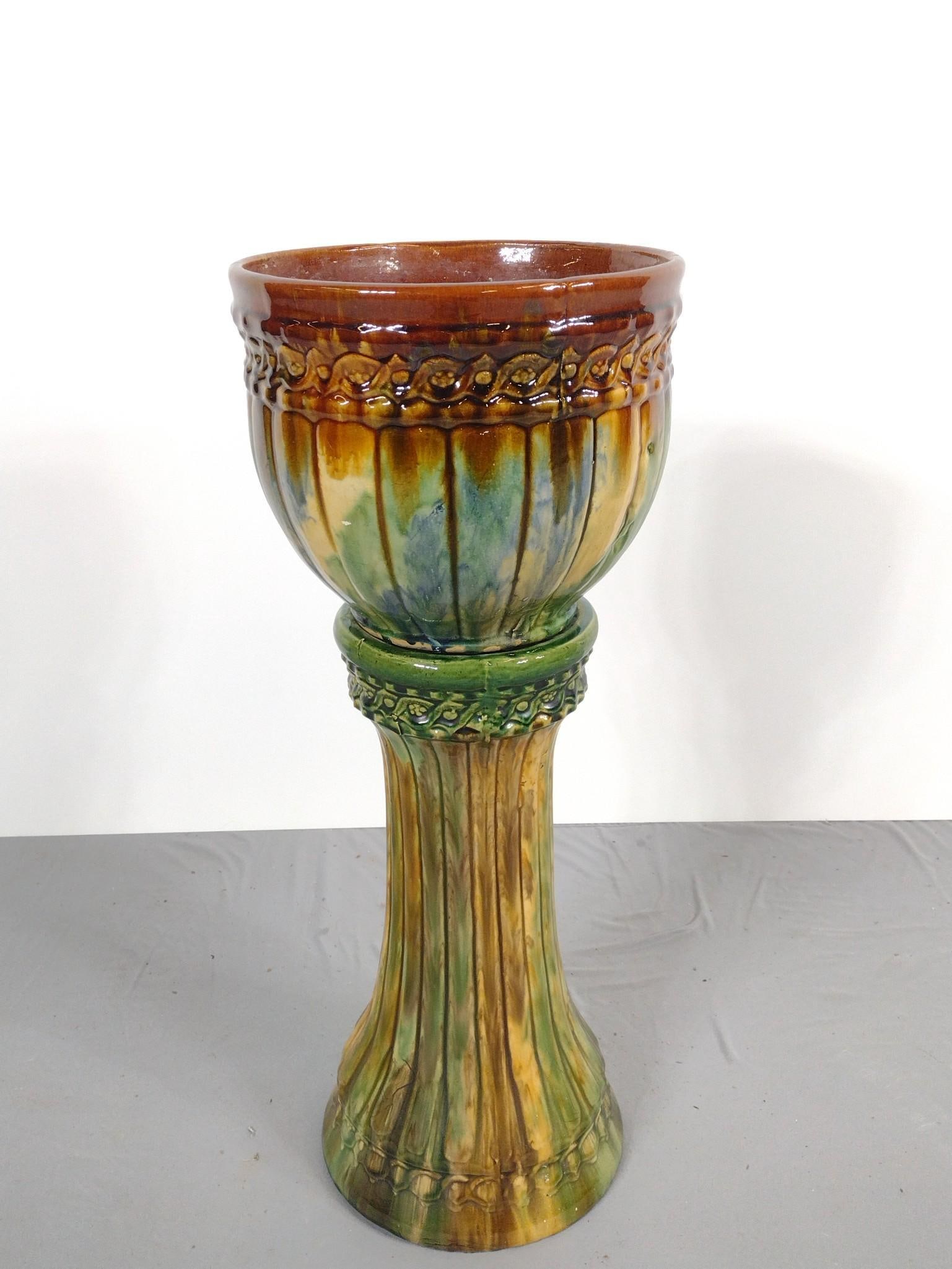 Majolica Jardiniere With Stand: NOT ELIGIBLE FOR IN-HOUSE SHIPPING. Overall 11" diameter X 28" high.