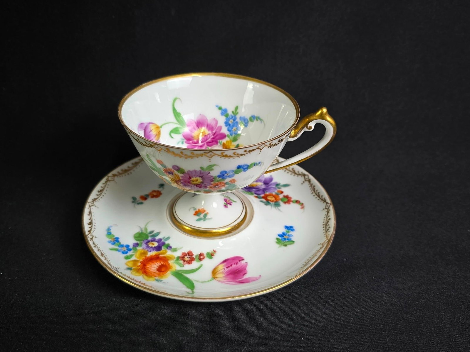 Dresden Cup and Saucer: Saucer: 5-3/4" diameter. Cup: 4-1/2" wide x 3-1/2" deep x 2-3/4" high.