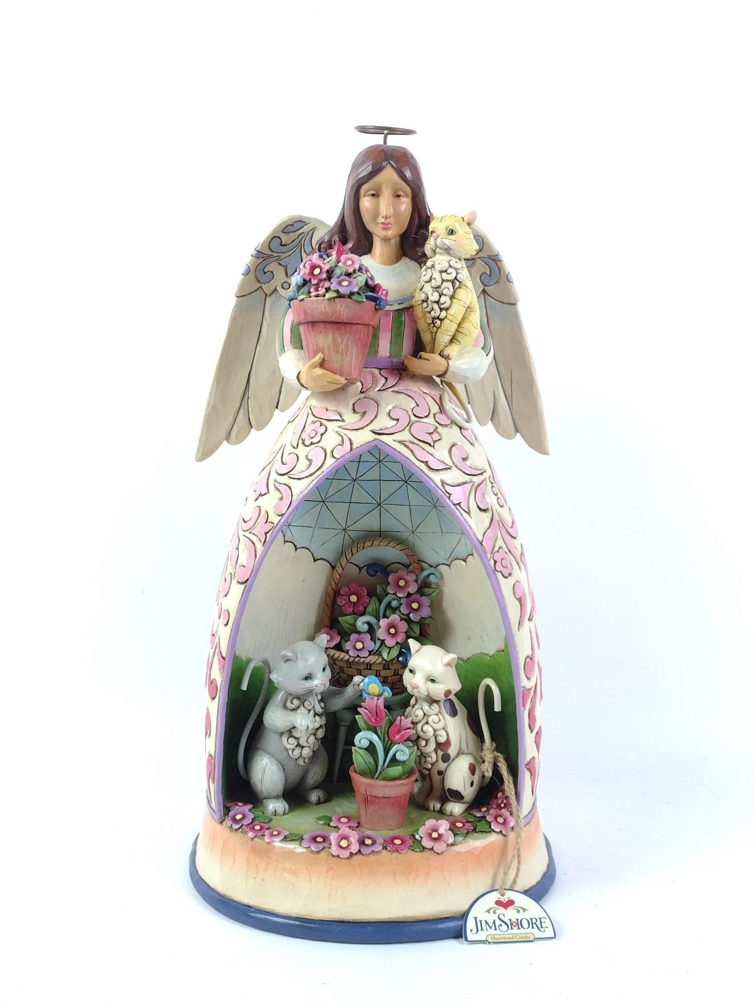 Jim Shore Heartwood Creek Garden Angel With Cats Sculpture: Item number 4011483. 11" wide x 9-1/2" deep x 19" high. Minor wear consistent with age and use. Battery pack in drawer at base does not appear to be working. Loss out of bottom corner of battery pack 